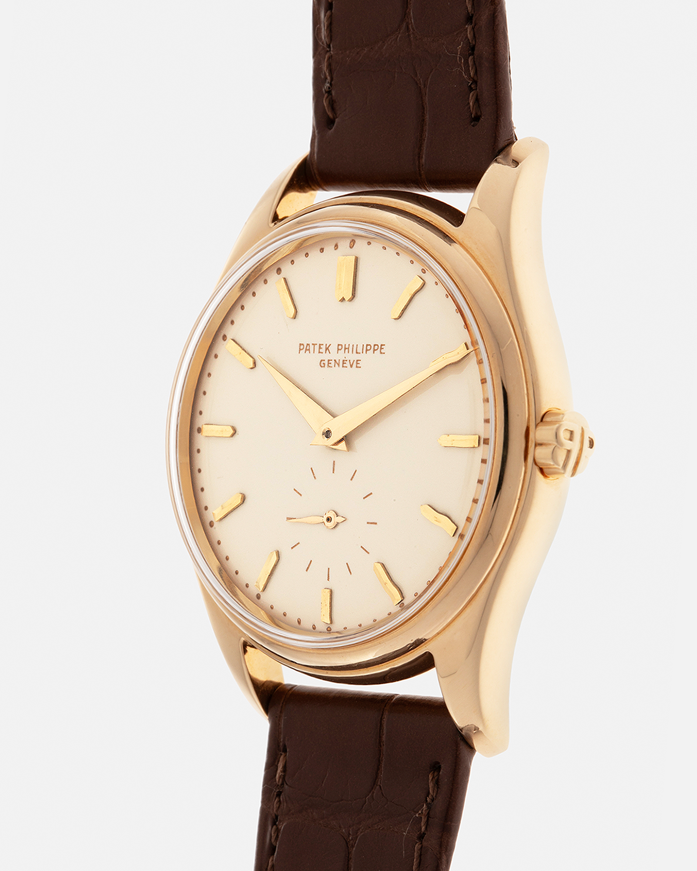 Brand: Patek Philippe
Year: 1957
Model: Calatrava
Reference: 2526, Third Series
Material: 18-carat Yellow Gold
Movement: Patek Philippe Cal. 12-600AT, Self-Winding
Case Dimensions: 36mm x 11.3mm (Lug-to-Lug 44mm)
Lug Width: 18mm
Strap: Patek Philippe Brown Calf Leather Strap with Signed 18-carat Yellow Gold Tang Buckle