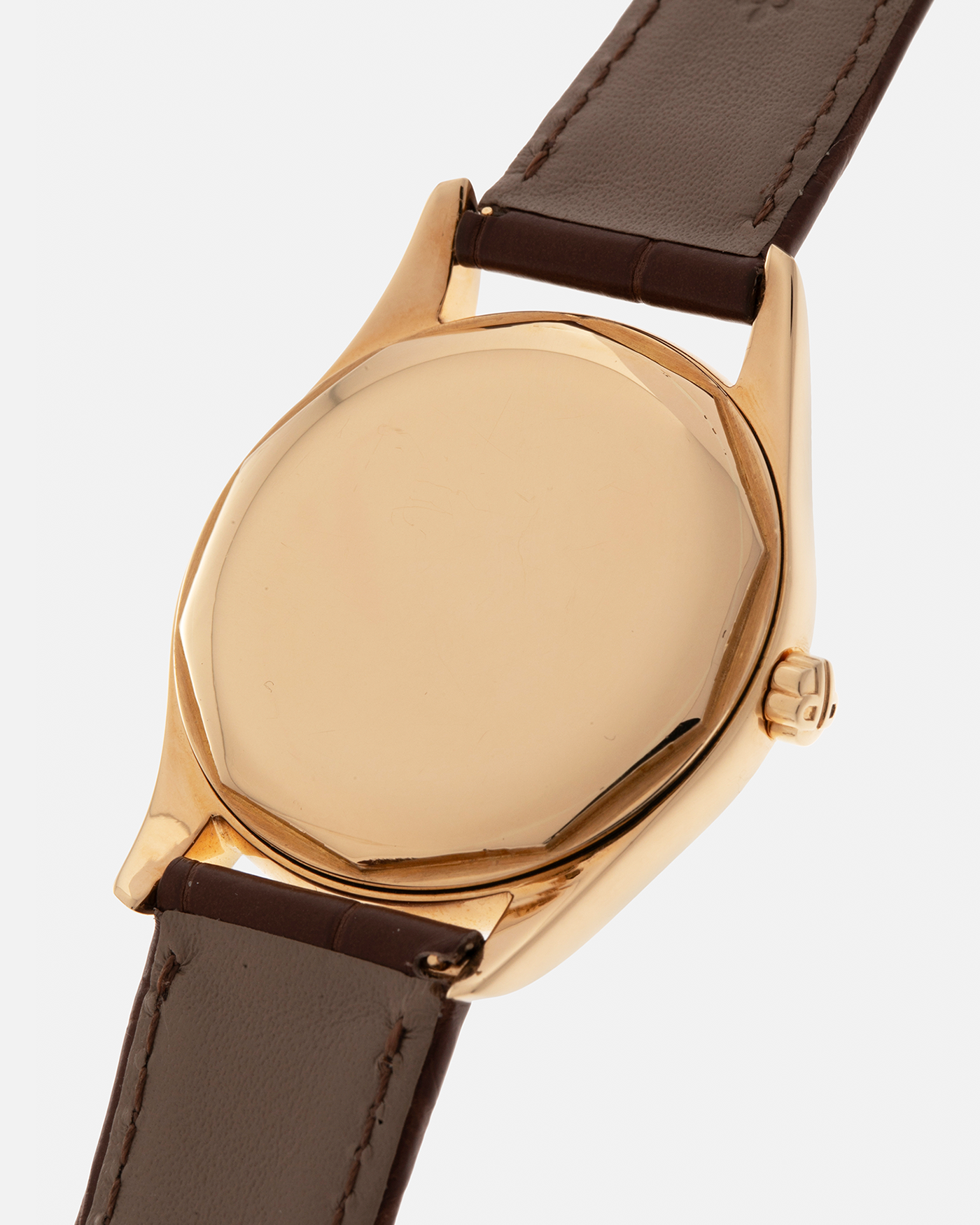 Brand: Patek Philippe
Year: 1957
Model: Calatrava
Reference: 2526, Third Series
Material: 18-carat Yellow Gold
Movement: Patek Philippe Cal. 12-600AT, Self-Winding
Case Dimensions: 36mm x 11.3mm (Lug-to-Lug 44mm)
Lug Width: 18mm
Strap: Patek Philippe Brown Calf Leather Strap with Signed 18-carat Yellow Gold Tang Buckle