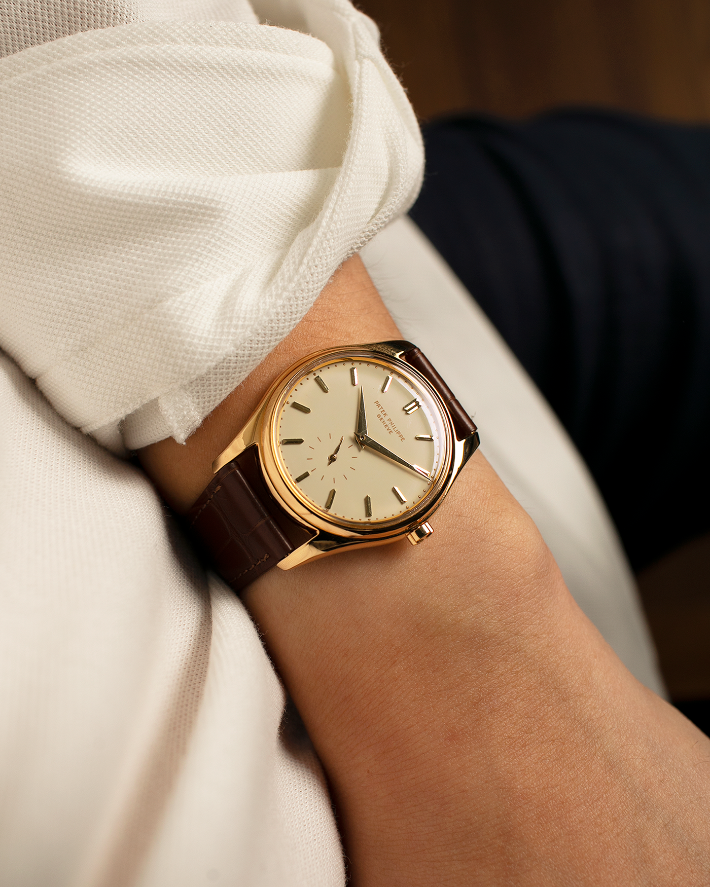 Brand: Patek Philippe
Year: 1957
Model: Calatrava
Reference: 2526, Third Series
Material: 18-carat Yellow Gold
Movement: Patek Philippe Cal. 12-600AT, Self-Winding
Case Dimensions: 36mm x 11.3mm (Lug-to-Lug 44mm)
Lug Width: 18mm
Strap: Patek Philippe Brown Calf Leather Strap with Signed 18-carat Yellow Gold Tang Buckle