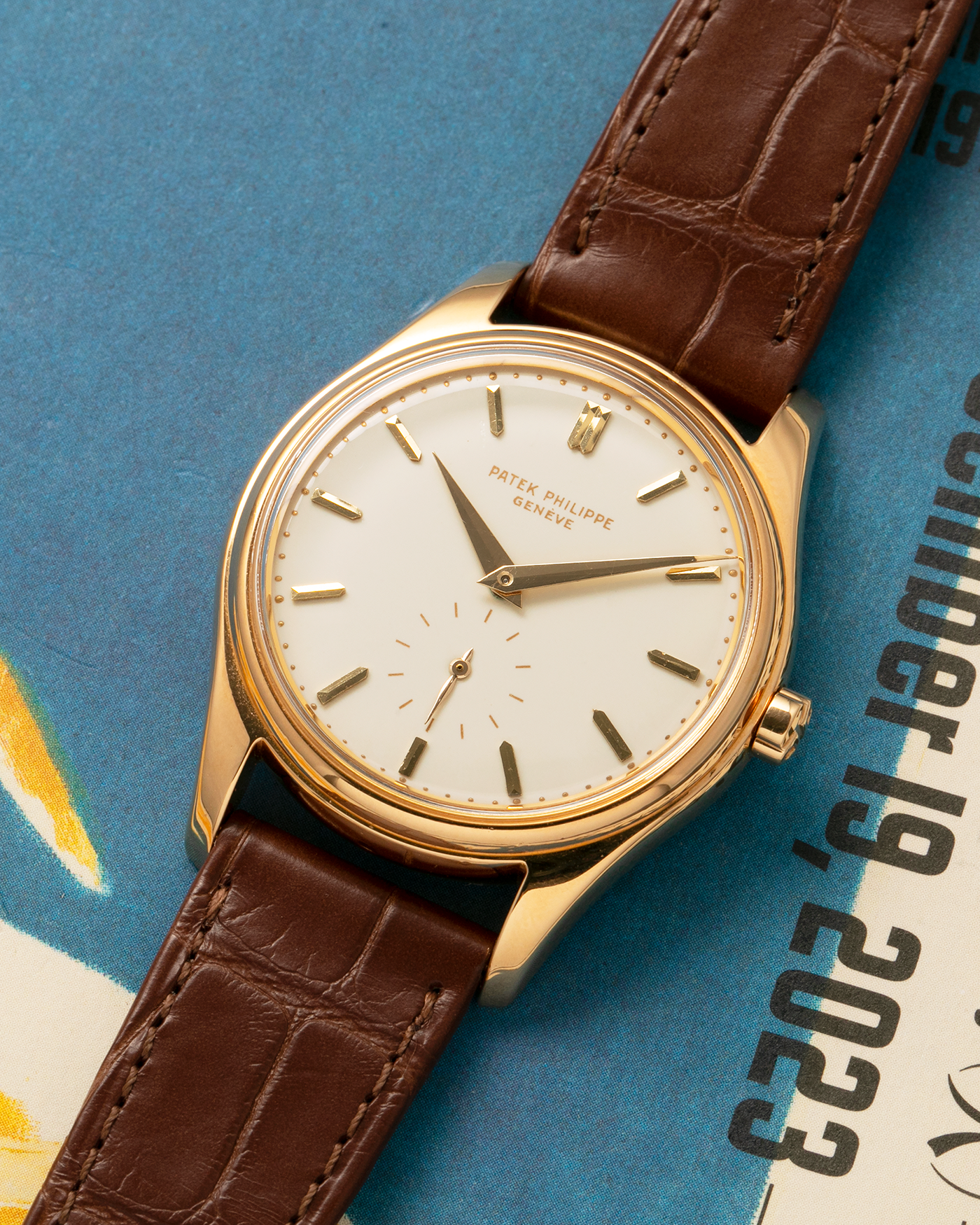Brand: Patek Philippe
Year: 1957
Model: Calatrava
Reference: 2526, Third Series
Material: 18-carat Yellow Gold
Movement: Patek Philippe Cal. 12-600AT, Self-Winding
Case Dimensions: 36mm x 11.3mm (Lug-to-Lug 44mm)
Lug Width: 18mm
Strap: Patek Philippe Brown Calf Leather Strap with Signed 18-carat Yellow Gold Tang Buckle