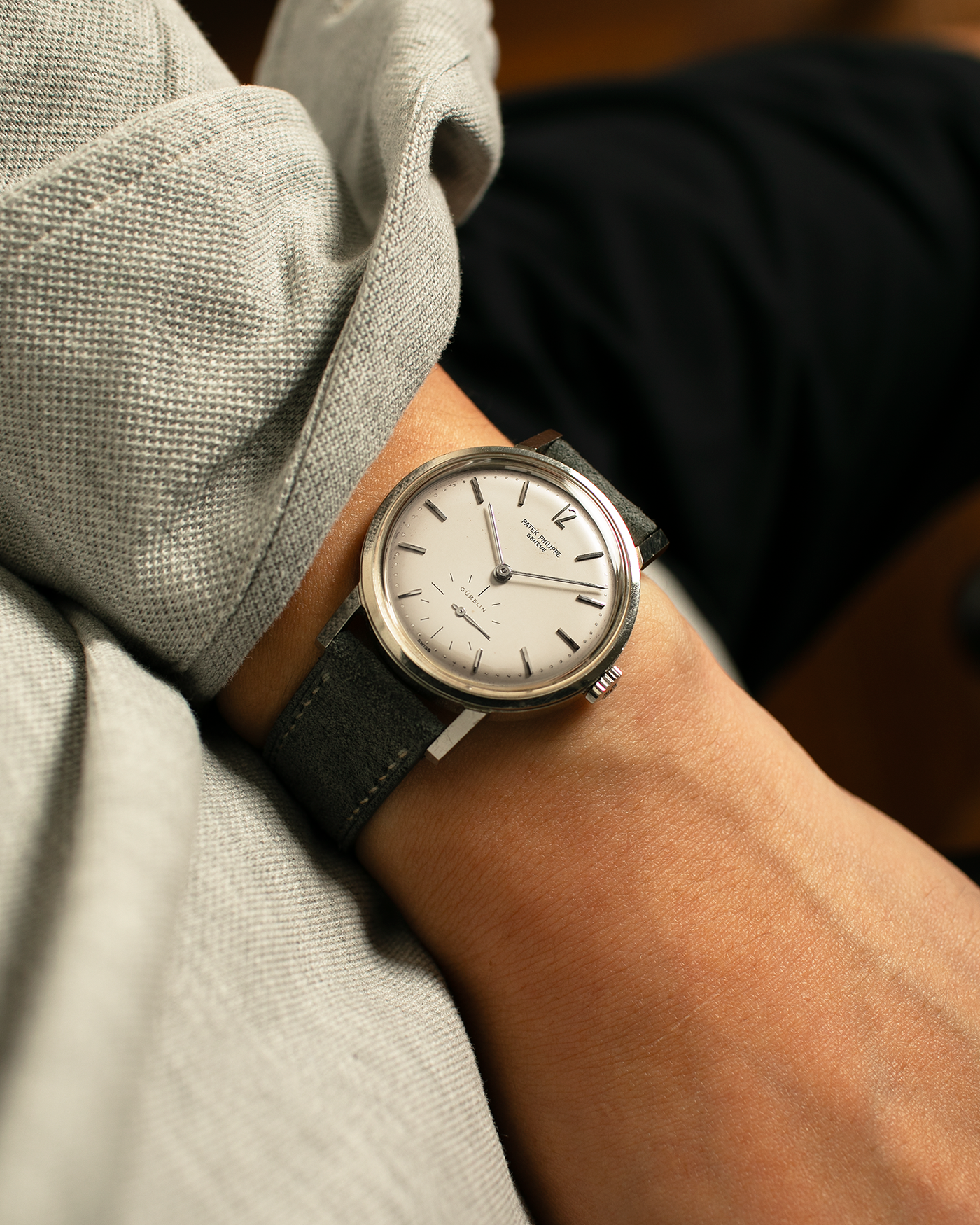 Brand: Patek Philippe
Year: 1966
Model: Calatrava, Gubelin Signed
Reference: 3417
Material: Stainless Steel
Movement: Patek Philippe Cal. 27-AM 400
Case Dimensions: 35mm Diameter 11mm Thickness
Lug Width: 18mm
Strap: Dream Rocketeers Grey Suede Strap with Generic Stainless Steel Buckle