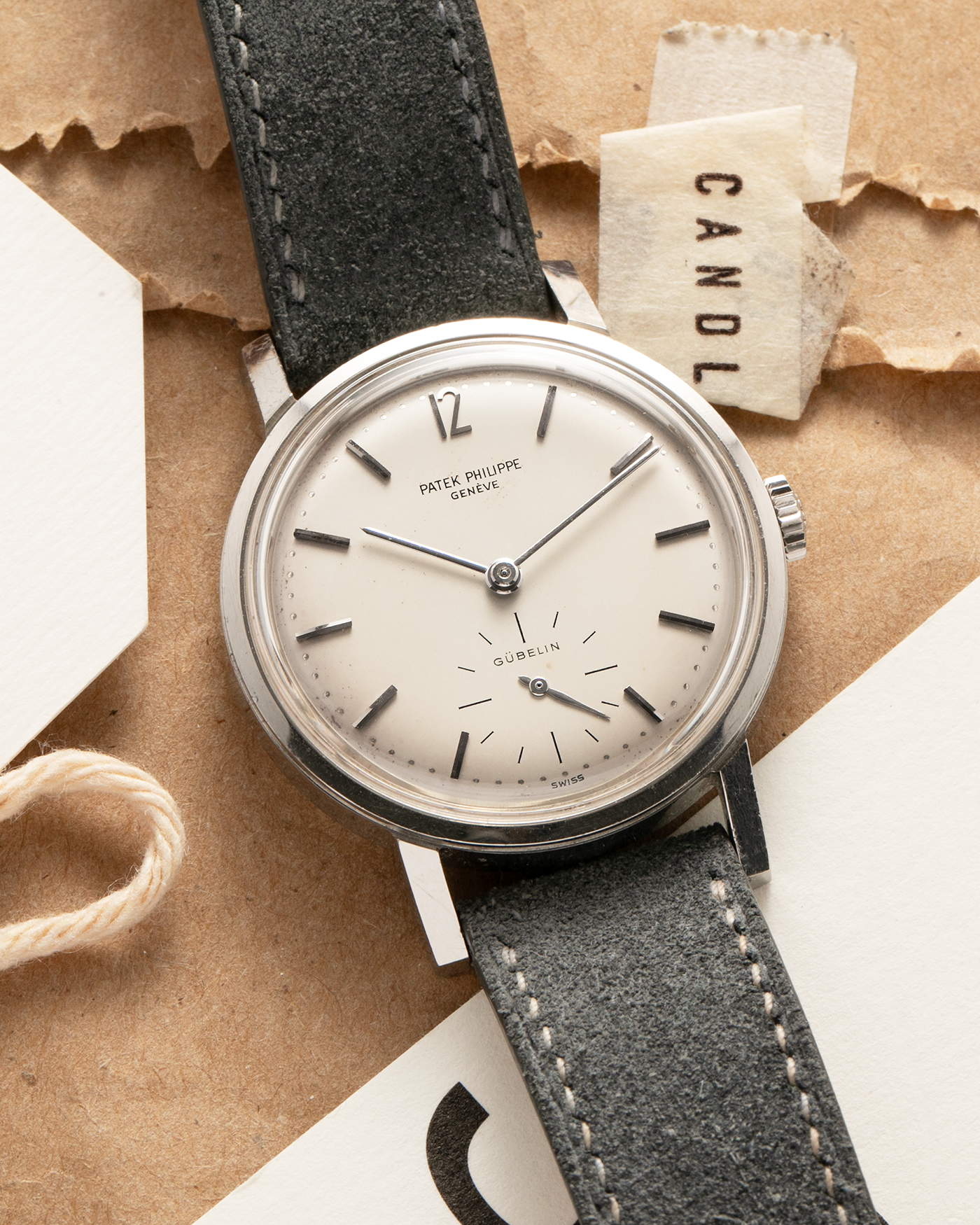 Brand: Patek Philippe
Year: 1966
Model: Calatrava, Gubelin Signed
Reference: 3417
Material: Stainless Steel
Movement: Patek Philippe Cal. 27-AM 400
Case Dimensions: 35mm Diameter 11mm Thickness
Lug Width: 18mm
Strap: Dream Rocketeers Grey Suede Strap with Generic Stainless Steel Buckle
