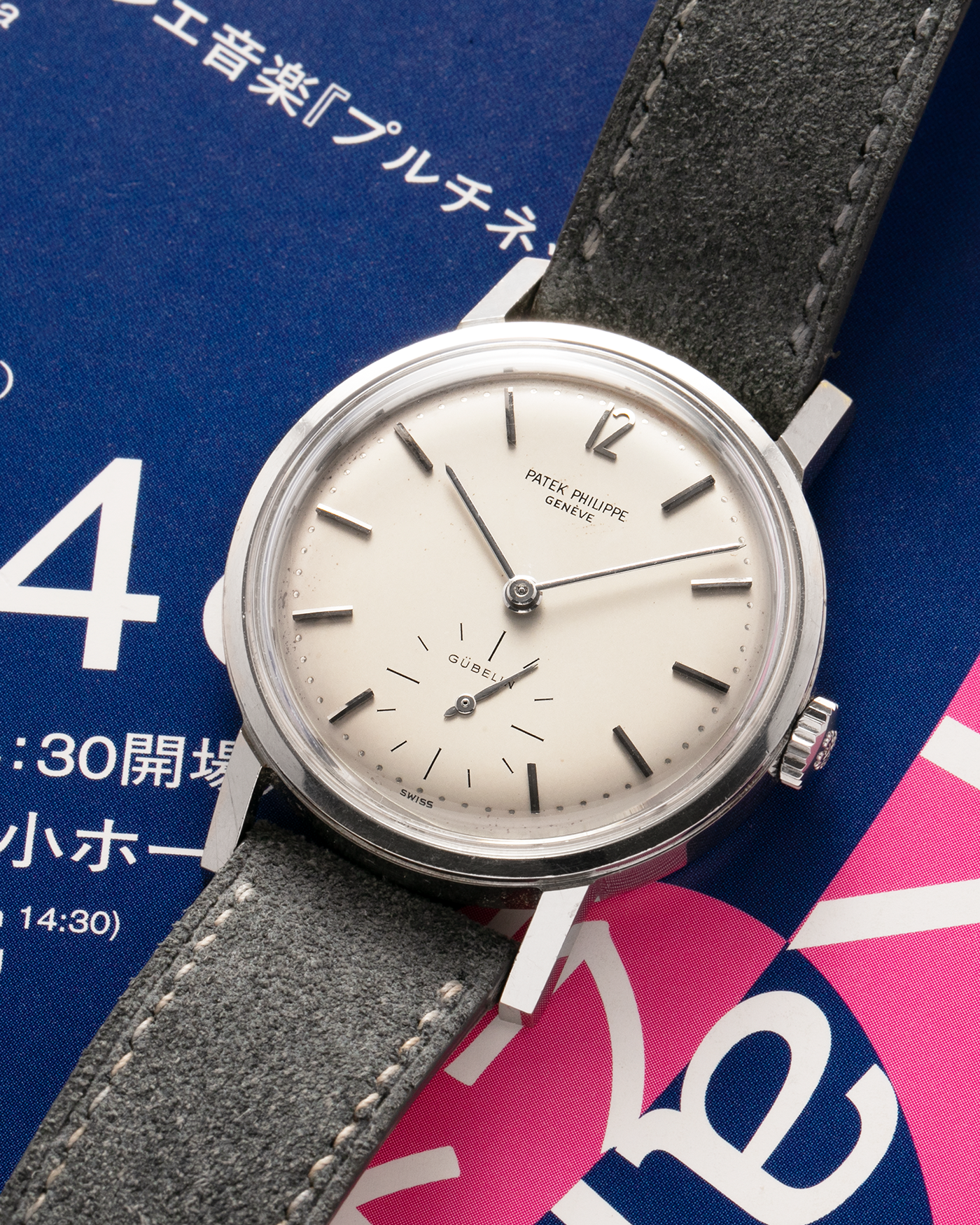 Brand: Patek Philippe
Year: 1966
Model: Calatrava, Gubelin Signed
Reference: 3417
Material: Stainless Steel
Movement: Patek Philippe Cal. 27-AM 400
Case Dimensions: 35mm Diameter 11mm Thickness
Lug Width: 18mm
Strap: Dream Rocketeers Grey Suede Strap with Generic Stainless Steel Buckle