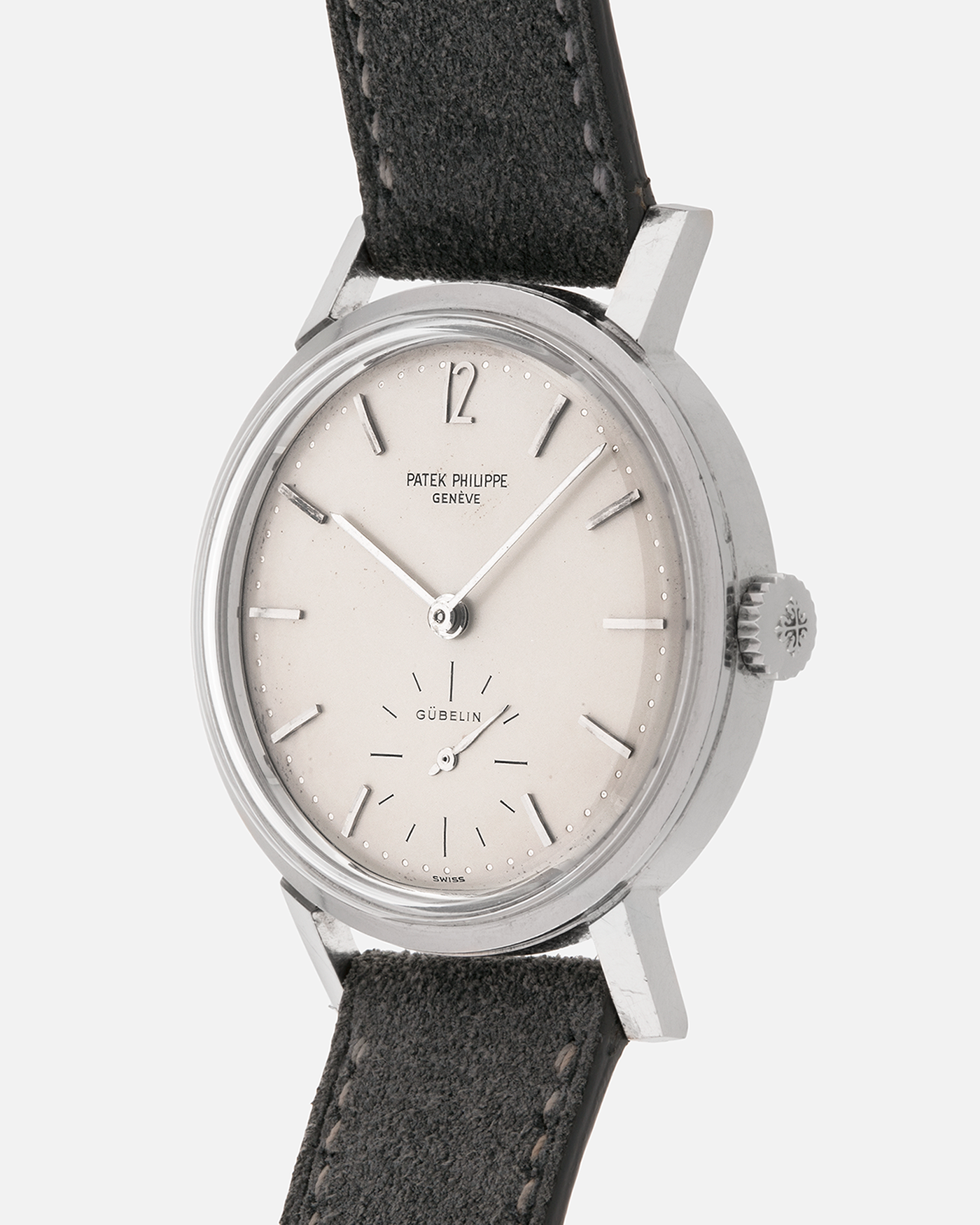 Brand: Patek Philippe
Year: 1966
Model: Calatrava, Gubelin Signed
Reference: 3417
Material: Stainless Steel
Movement: Patek Philippe Cal. 27-AM 400
Case Dimensions: 35mm Diameter 11mm Thickness
Lug Width: 18mm
Strap: Dream Rocketeers Grey Suede Strap with Generic Stainless Steel Buckle
