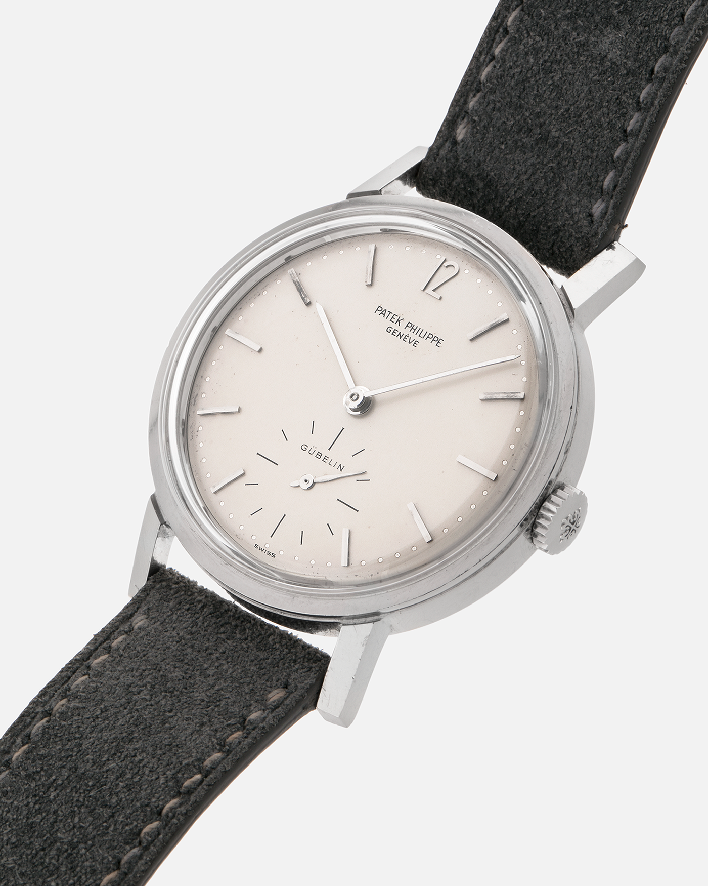 Brand: Patek Philippe
Year: 1966
Model: Calatrava, Gubelin Signed
Reference: 3417
Material: Stainless Steel
Movement: Patek Philippe Cal. 27-AM 400
Case Dimensions: 35mm Diameter 11mm Thickness
Lug Width: 18mm
Strap: Dream Rocketeers Grey Suede Strap with Generic Stainless Steel Buckle