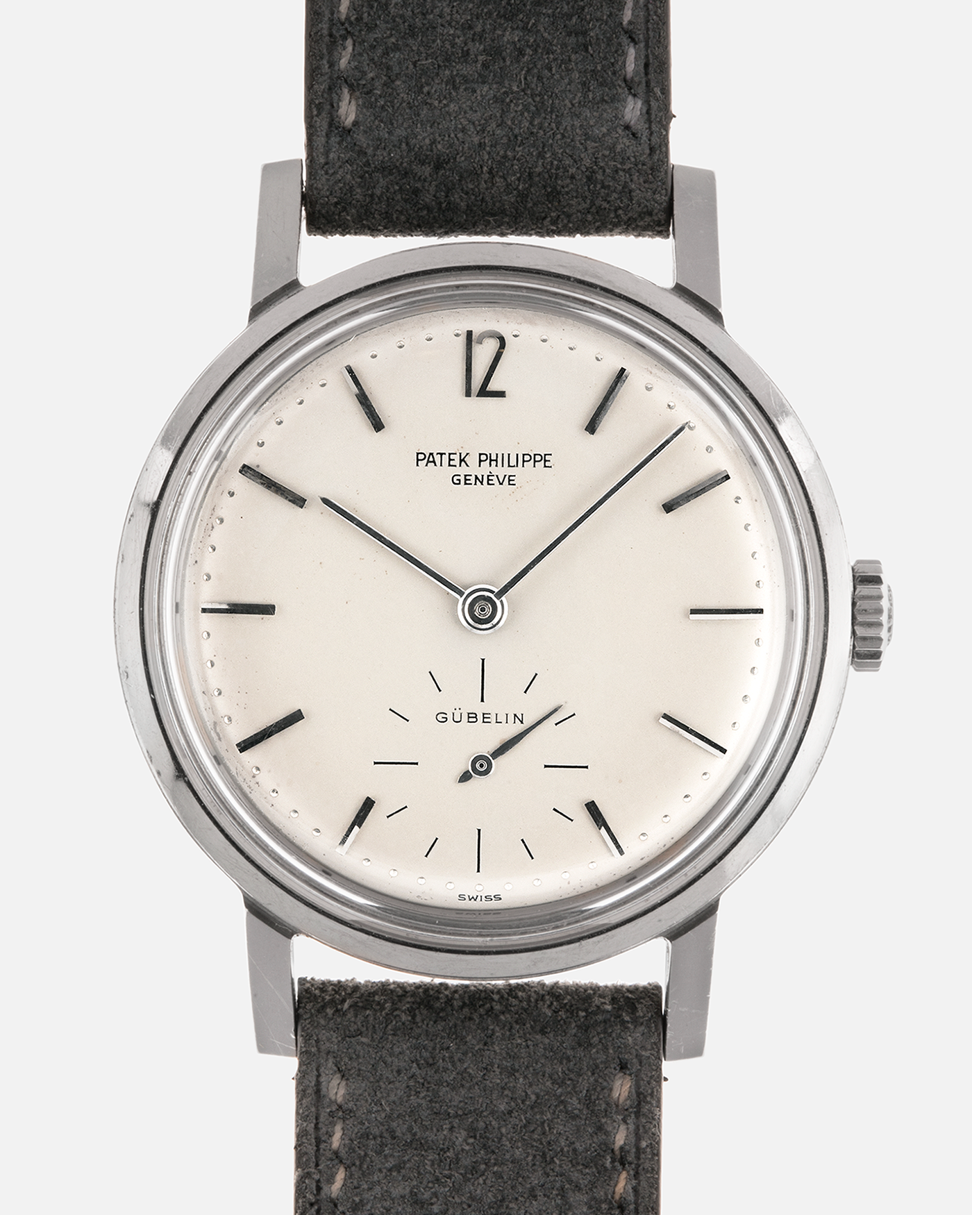 Brand: Patek Philippe
Year: 1966
Model: Calatrava, Gubelin Signed
Reference: 3417
Material: Stainless Steel
Movement: Patek Philippe Cal. 27-AM 400
Case Dimensions: 35mm Diameter 11mm Thickness
Lug Width: 18mm
Strap: Dream Rocketeers Grey Suede Strap with Generic Stainless Steel Buckle