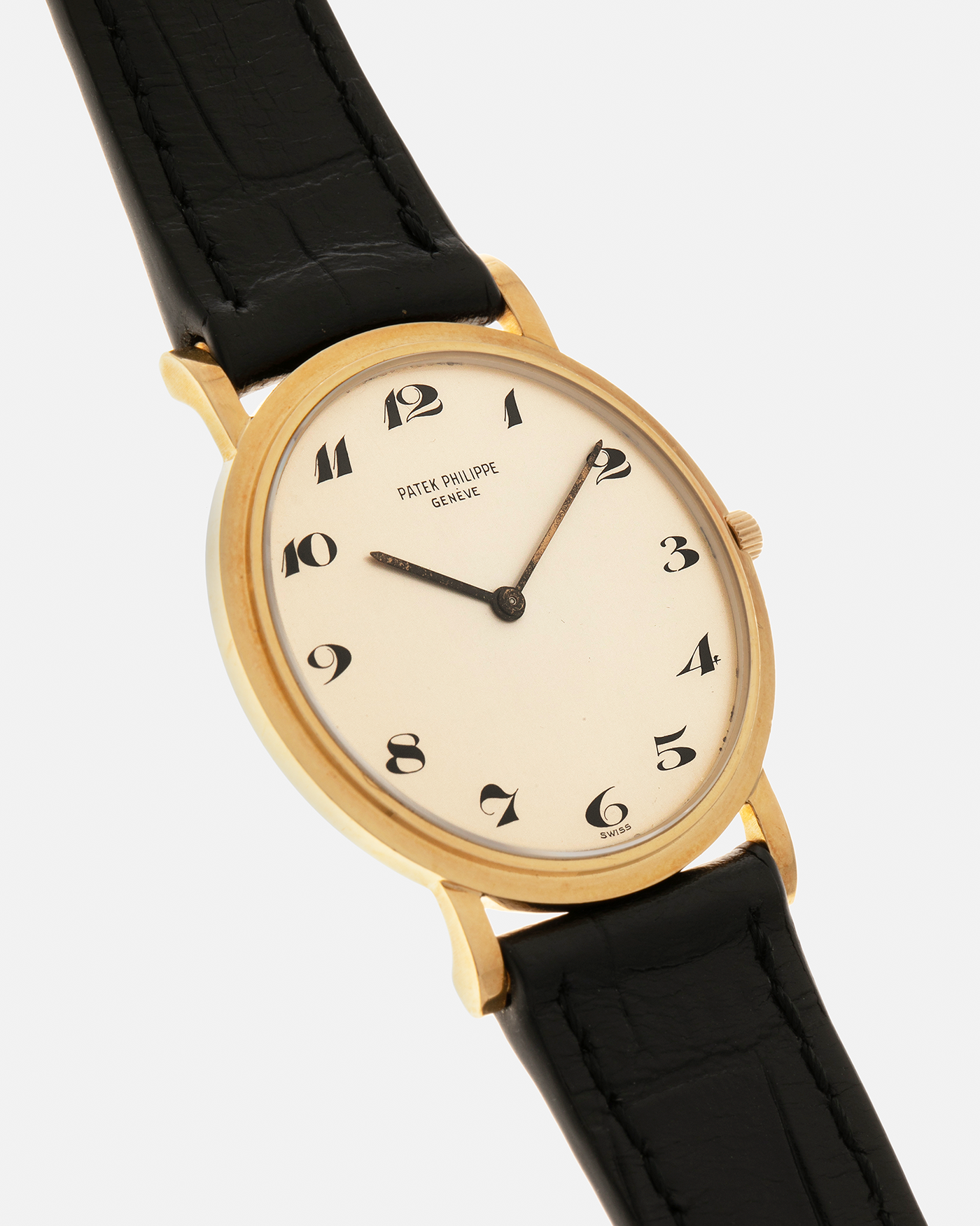 Brand: Patek Philippe
Year: 1970s
Model: Calatrava
Reference Number: 3520J
Material: 18-carat Yellow Gold
Movement: Patek Philippe Cal. 175 (Based on F. Piguet Cal. 21 ébauche), Manual-Winding
Case Dimensions: 33.5mm x 4.8mm (Lug-to-Lug 36mm)
Lug Width: 18mm
Strap: Generic Black Alligator Leather Strap