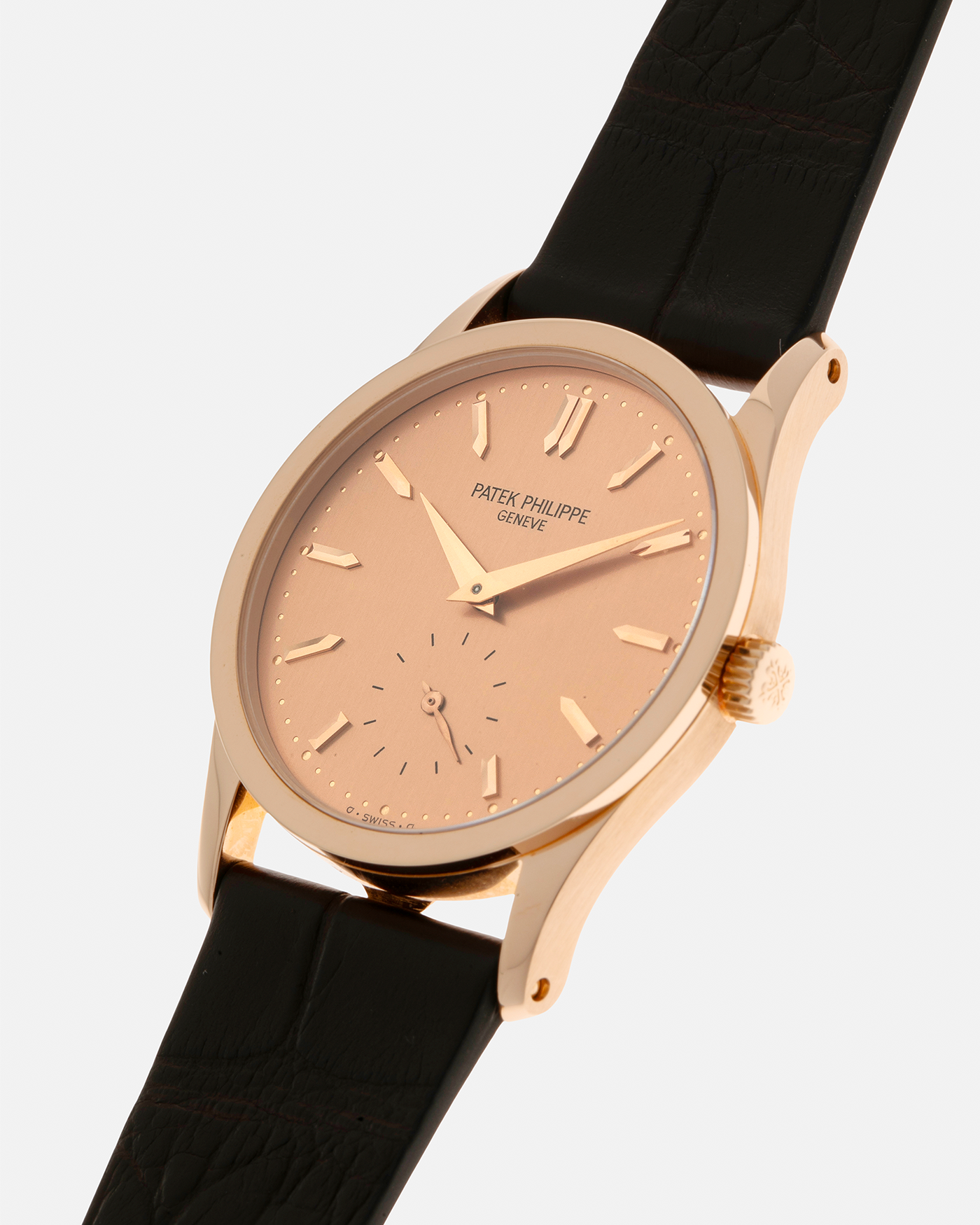 Brand: Patek Philippe
Year: 1993
Model: Calatrava
Reference: 3796R
Material: 18-carat Rose Gold
Movement: Patek Philippe Cal. 215 PS, Manual-Winding
Case Dimensions: 31mm x 7mm (Lug-to-Lug 37mm)
Lug Width: 18mm
Strap: Handdn Dark Brown Alligator Stitchless Leather Strap with Signed 18-carat Rose Gold Tang Buckle