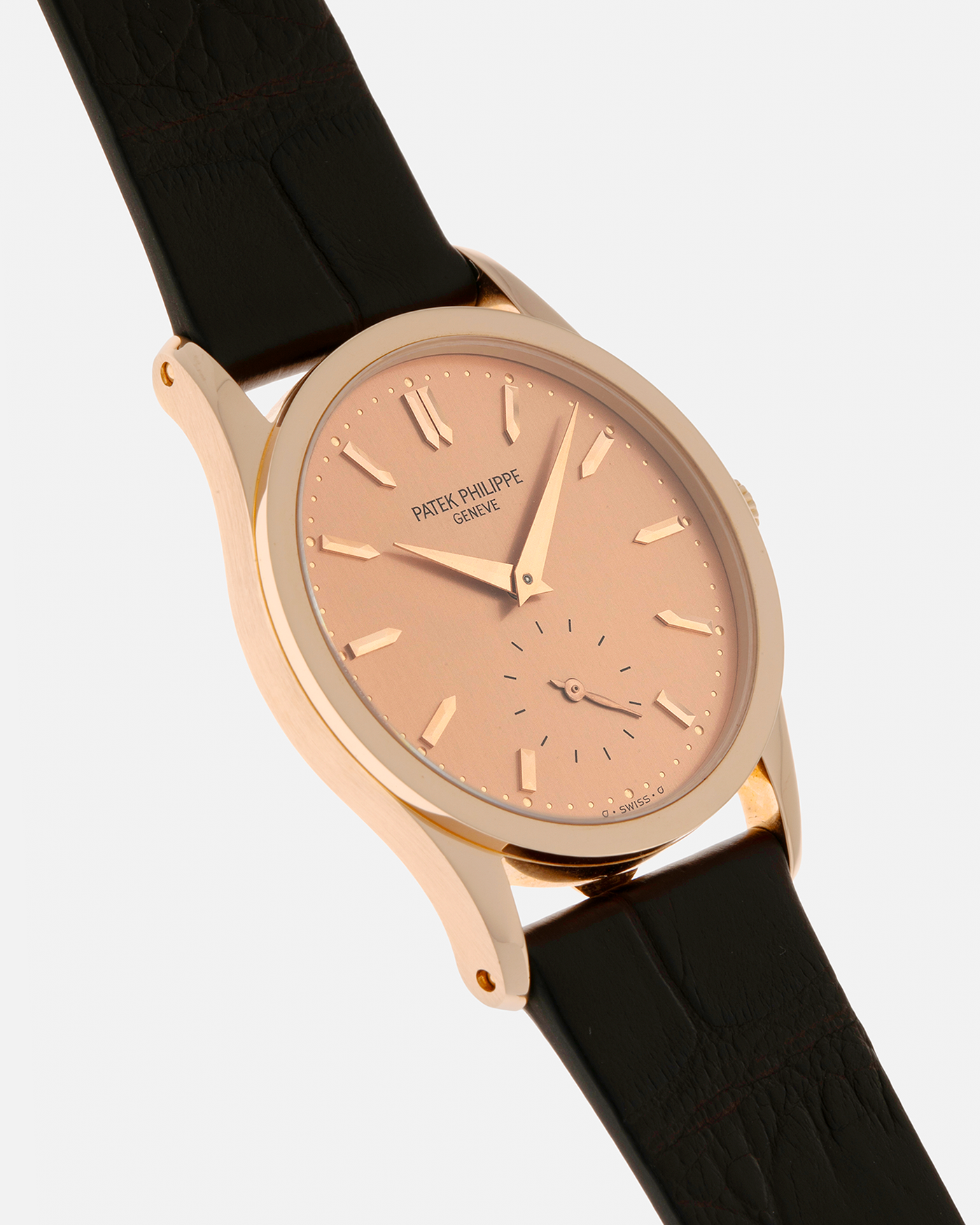 Brand: Patek Philippe
Year: 1993
Model: Calatrava
Reference: 3796R
Material: 18-carat Rose Gold
Movement: Patek Philippe Cal. 215 PS, Manual-Winding
Case Dimensions: 31mm x 7mm (Lug-to-Lug 37mm)
Lug Width: 18mm
Strap: Handdn Dark Brown Alligator Stitchless Leather Strap with Signed 18-carat Rose Gold Tang Buckle
