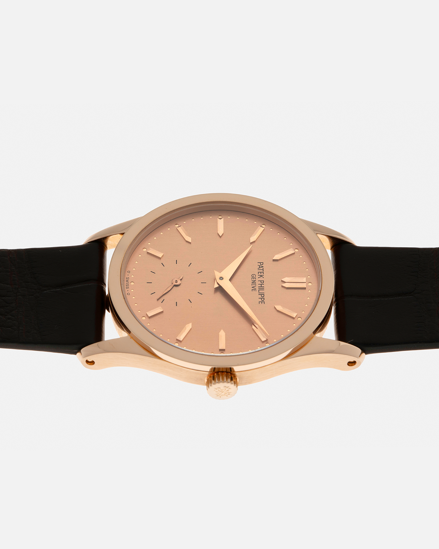 Brand: Patek Philippe
Year: 1993
Model: Calatrava
Reference: 3796R
Material: 18-carat Rose Gold
Movement: Patek Philippe Cal. 215 PS, Manual-Winding
Case Dimensions: 31mm x 7mm (Lug-to-Lug 37mm)
Lug Width: 18mm
Strap: Handdn Dark Brown Alligator Stitchless Leather Strap with Signed 18-carat Rose Gold Tang Buckle