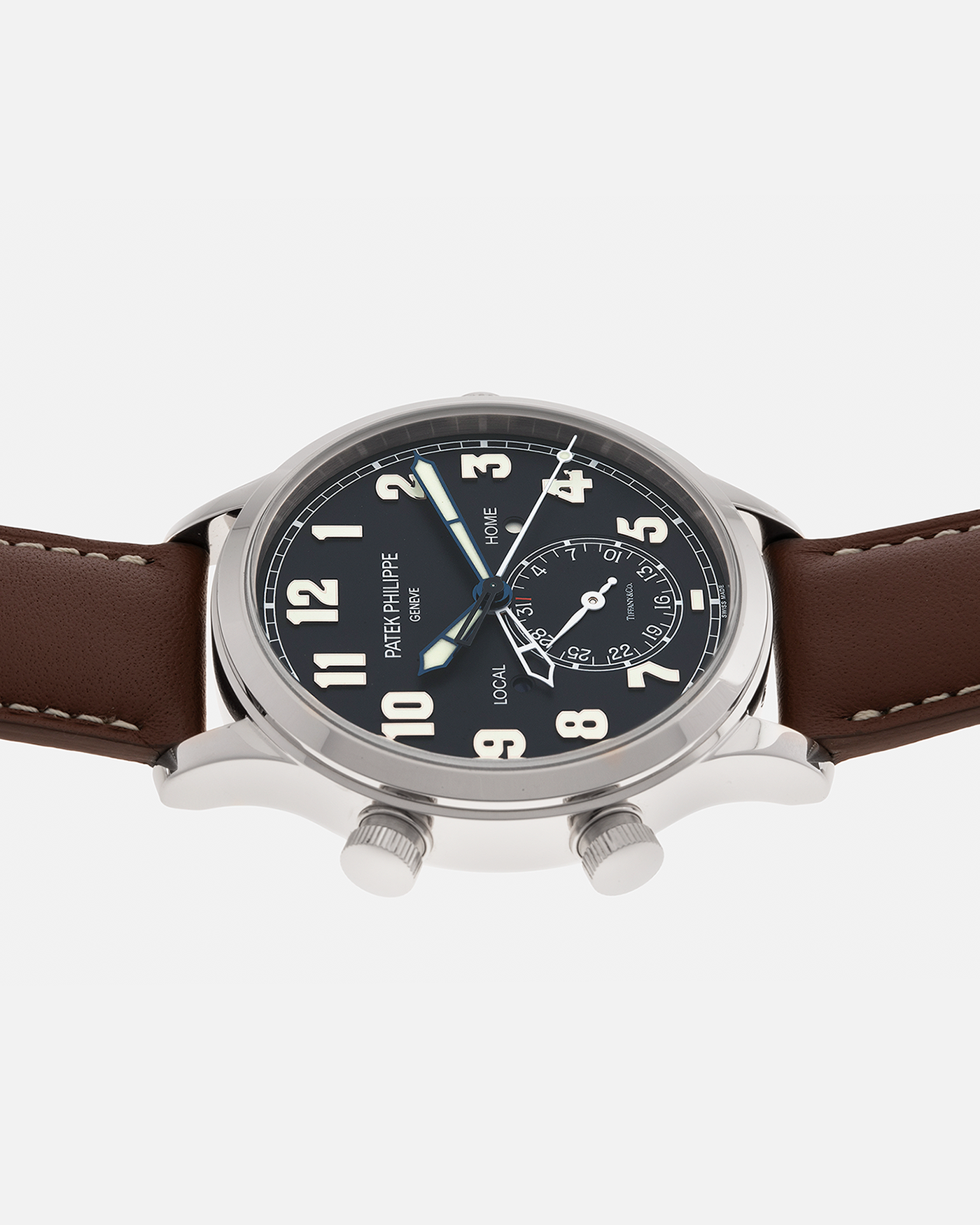 Brand: Patek Philippe
Year: 2020
Model: Calatrava Pilot Travel Time ‘Tiffany & Co.’
Reference: 5524G
Material: 18-carat White Gold
Movement: Patek Philippe Cal. 324 S C FUS, Self-Winding
Case Diameter: 42mm x 10.8mm (Lug-to-Lug 50mm)
Lug Width: 22mm
Strap: Patek Philippe Brown Leather Strap with Signed 18-carat White Gold Tang Buckle
