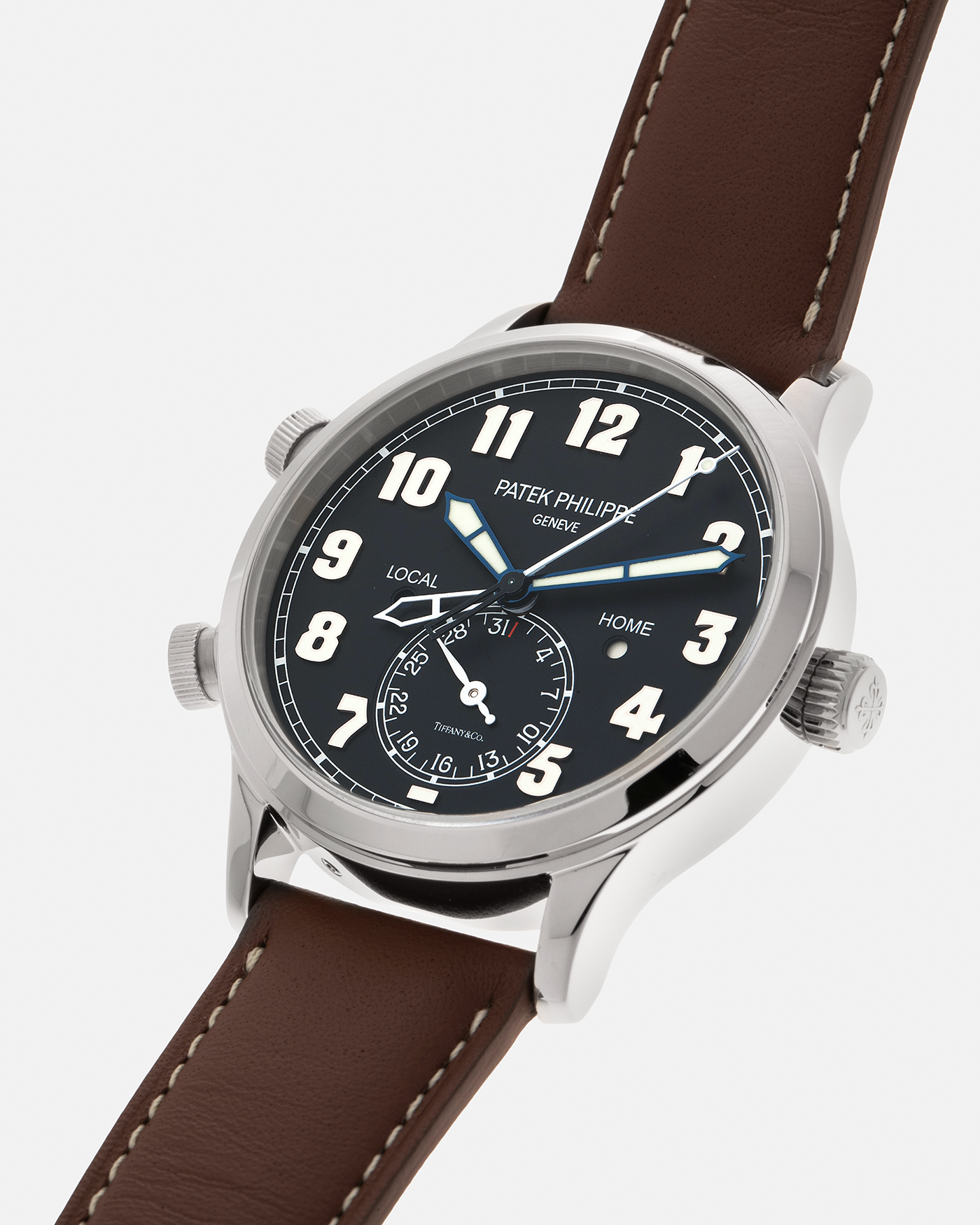 Brand: Patek Philippe
Year: 2020
Model: Calatrava Pilot Travel Time ‘Tiffany & Co.’
Reference: 5524G
Material: 18-carat White Gold
Movement: Patek Philippe Cal. 324 S C FUS, Self-Winding
Case Diameter: 42mm x 10.8mm (Lug-to-Lug 50mm)
Lug Width: 22mm
Strap: Patek Philippe Brown Leather Strap with Signed 18-carat White Gold Tang Buckle