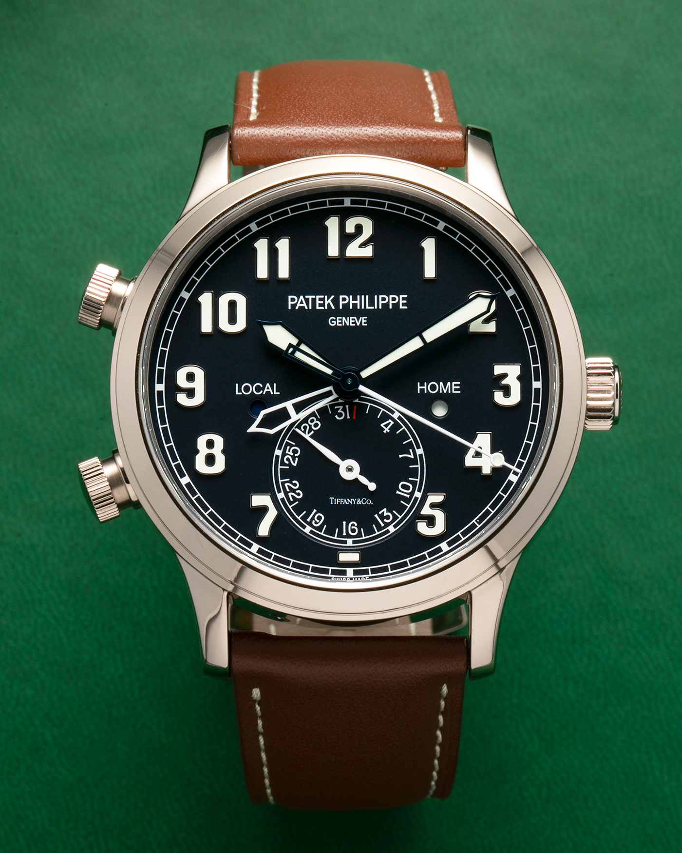 Brand: Patek Philippe
Year: 2020
Model: Calatrava Pilot Travel Time ‘Tiffany & Co.’
Reference: 5524G
Material: 18-carat White Gold
Movement: Patek Philippe Cal. 324 S C FUS, Self-Winding
Case Diameter: 42mm x 10.8mm (Lug-to-Lug 50mm)
Lug Width: 22mm
Strap: Patek Philippe Brown Leather Strap with Signed 18-carat White Gold Tang Buckle