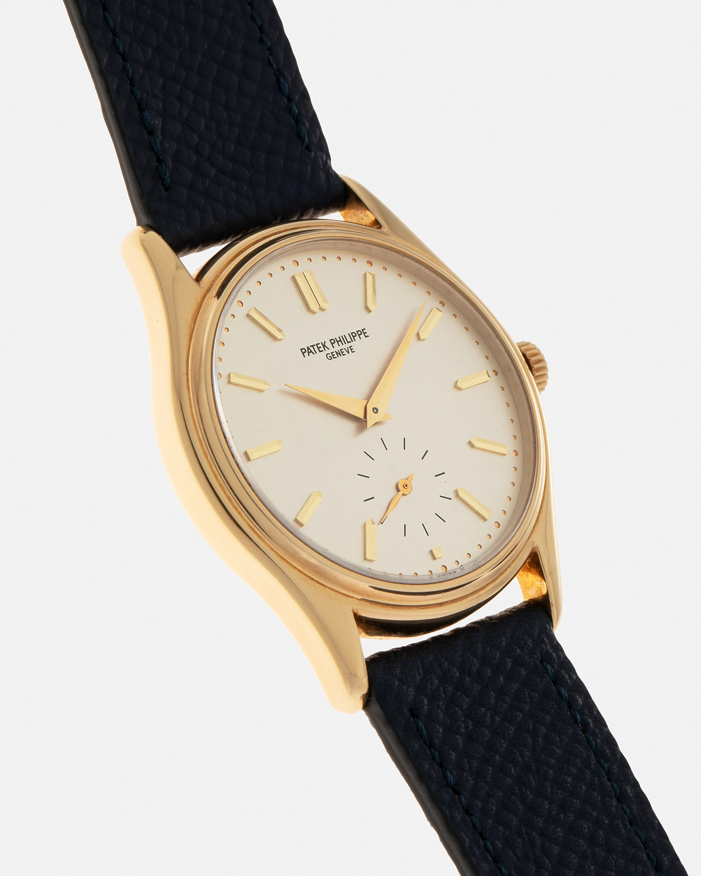 Brand: Patek Philippe
Year: 1990’s
Model: Calatrava
Reference: 5023
Material: 18-carat Yellow Gold
Movement: Patek Philippe Cal. 215 PS, Manual-Winding
Case Diameter: 33mm x 7mm (39.8mm Lug-to-Lug)
Lug Width: 18mm
Strap: Molequin Navy Blue Grained Calf Strap with Signed 18-carat Yellow Gold Tang Buckle