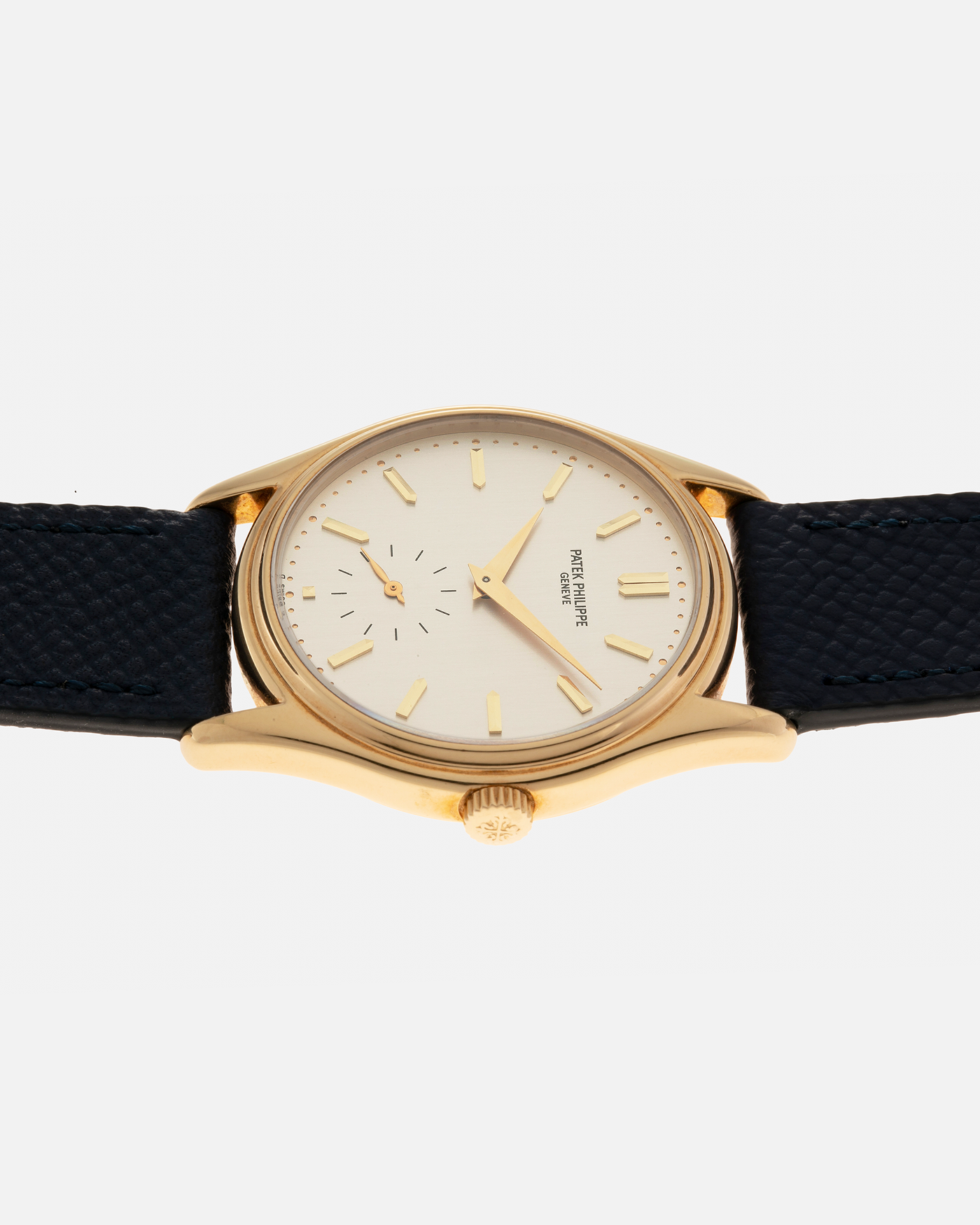 Brand: Patek Philippe
Year: 1990’s
Model: Calatrava
Reference: 5023
Material: 18-carat Yellow Gold
Movement: Patek Philippe Cal. 215 PS, Manual-Winding
Case Diameter: 33mm x 7mm (39.8mm Lug-to-Lug)
Lug Width: 18mm
Strap: Molequin Navy Blue Grained Calf Strap with Signed 18-carat Yellow Gold Tang Buckle
