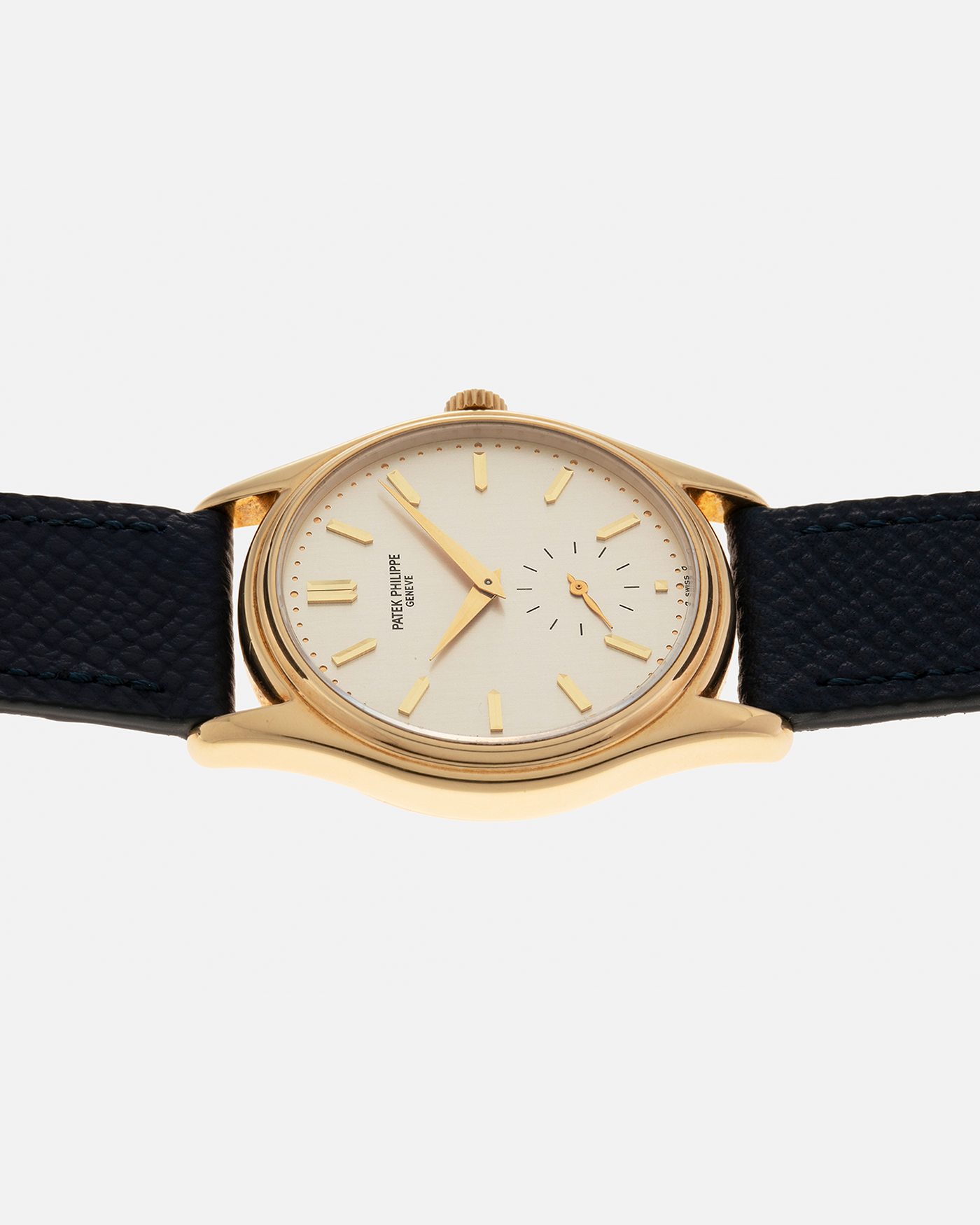 Brand: Patek Philippe
Year: 1990’s
Model: Calatrava
Reference: 5023
Material: 18-carat Yellow Gold
Movement: Patek Philippe Cal. 215 PS, Manual-Winding
Case Diameter: 33mm x 7mm (39.8mm Lug-to-Lug)
Lug Width: 18mm
Strap: Molequin Navy Blue Grained Calf Strap with Signed 18-carat Yellow Gold Tang Buckle