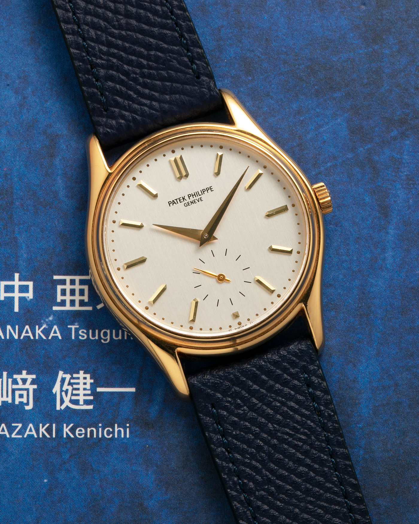 Brand: Patek Philippe
Year: 1990’s
Model: Calatrava
Reference: 5023
Material: 18-carat Yellow Gold
Movement: Patek Philippe Cal. 215 PS, Manual-Winding
Case Diameter: 33mm x 7mm (39.8mm Lug-to-Lug)
Lug Width: 18mm
Strap: Molequin Navy Blue Grained Calf Strap with Signed 18-carat Yellow Gold Tang Buckle
