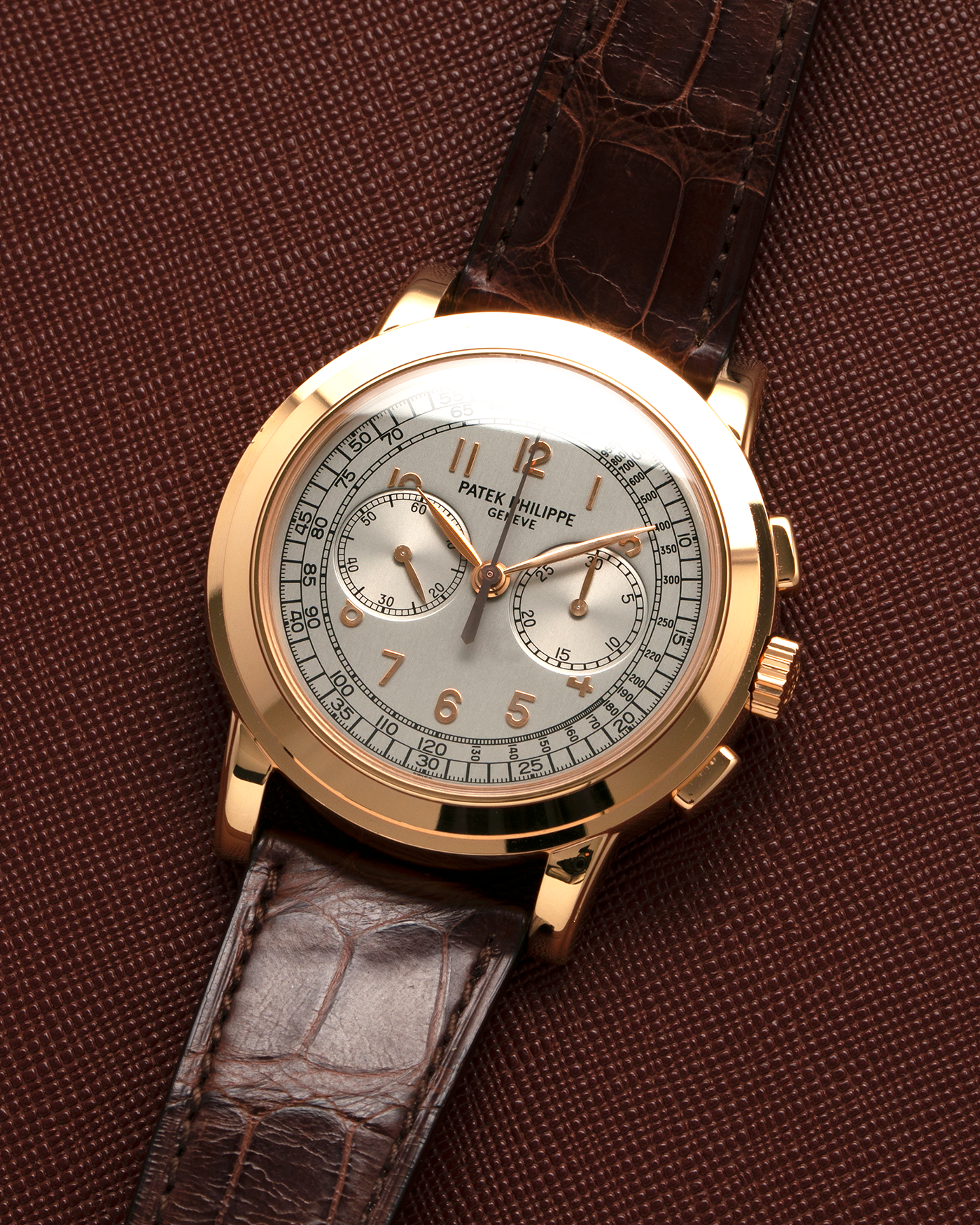 Brand: Patek Philippe 
Year: 2000s
Model: Chronograph
Reference: 5070R
Material: 18-carat Rose Gold
Movement: Patek Philippe Cal. 27-20 CHR (Based on Lemania Cal. 2310), Manual-Winding
Case Dimensions: 42mm x 11.6mm (Lug-to-Lug 48.4mm)
Strap: Patek Philippe Dark Brown Alligator Leather Strap with Signed 18-carat Yellow Gold Deployant Clasp