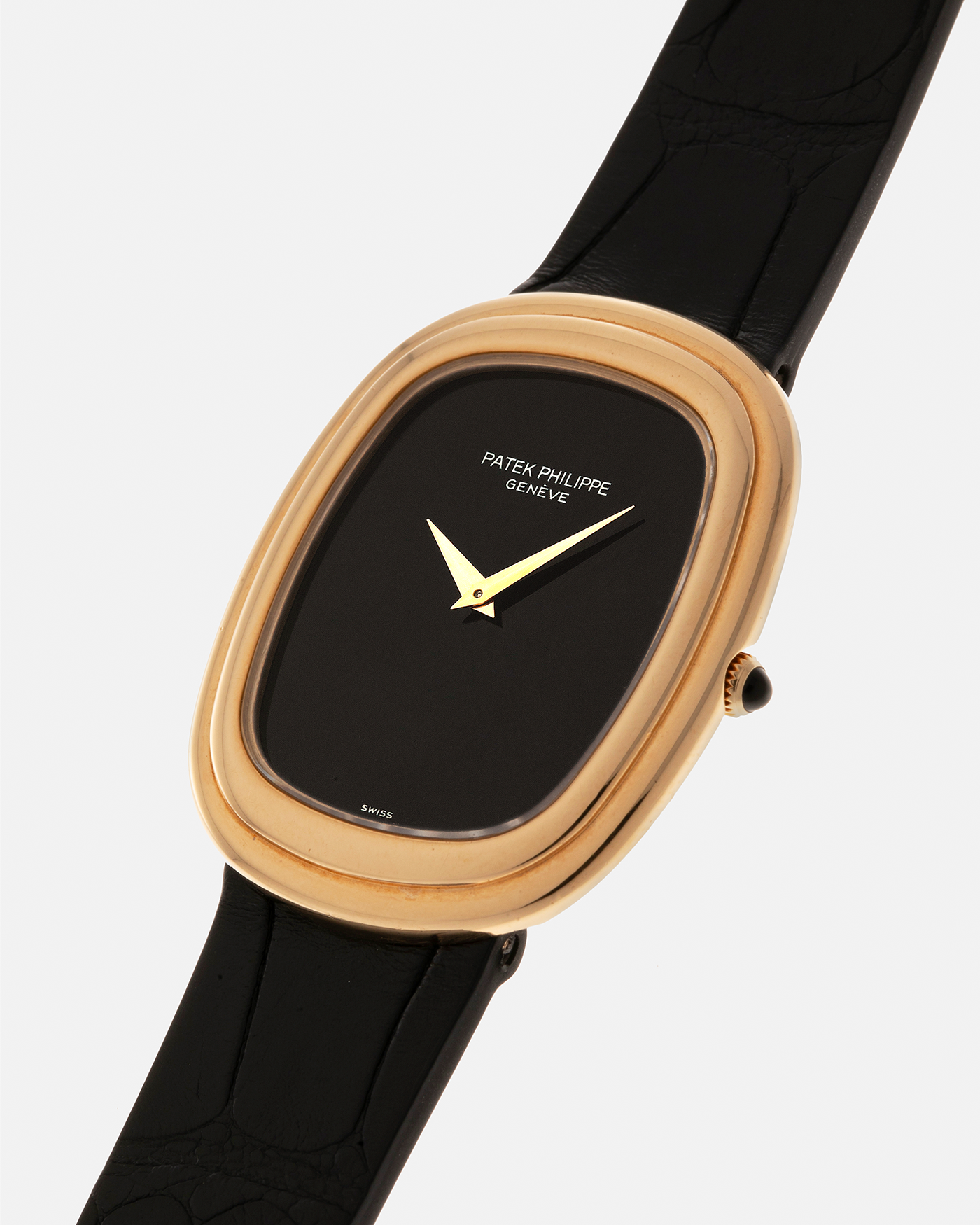 Brand: Patek Philippe
Year: 1977
Model: Ellipse
Reference Number: 3730
Material: 18-carat Yellow Gold Case, Onyx Dial
Movement: Patek Philippe Cal. 215, Manual-Winding
Case Dimensions: 31mm x 6mm (Lug-to-Lug 38.5mm)
Lug Width: 17mm
Strap: Custom Handdn Black Alligator Stitchless Leather Strap with Signed 18-carat Yellow Gold Ellipse Buckle