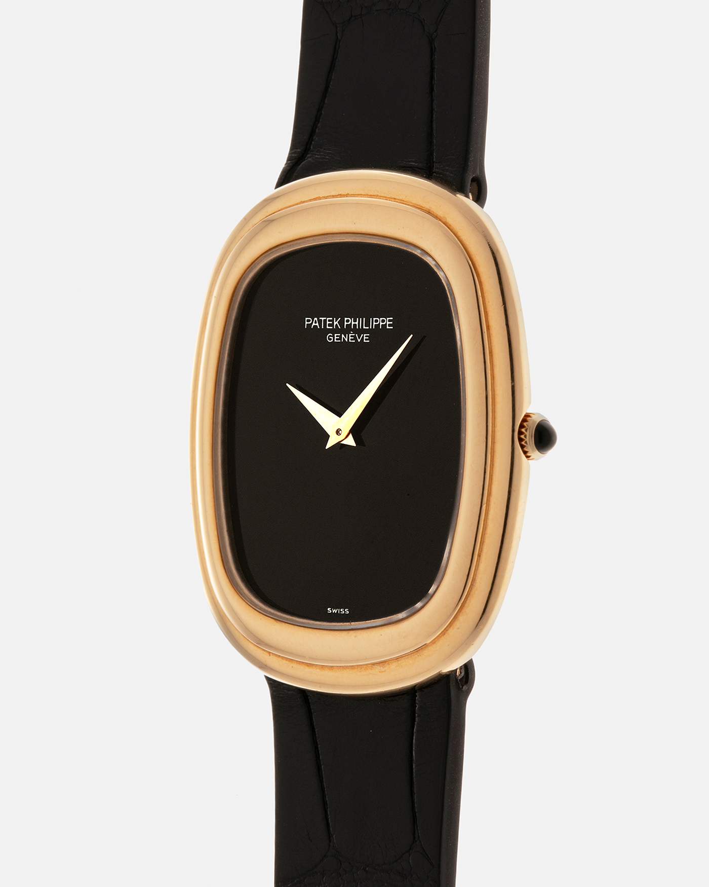 Brand: Patek Philippe
Year: 1977
Model: Ellipse
Reference Number: 3730
Material: 18-carat Yellow Gold Case, Onyx Dial
Movement: Patek Philippe Cal. 215, Manual-Winding
Case Dimensions: 31mm x 6mm (Lug-to-Lug 38.5mm)
Lug Width: 17mm
Strap: Custom Handdn Black Alligator Stitchless Leather Strap with Signed 18-carat Yellow Gold Ellipse Buckle