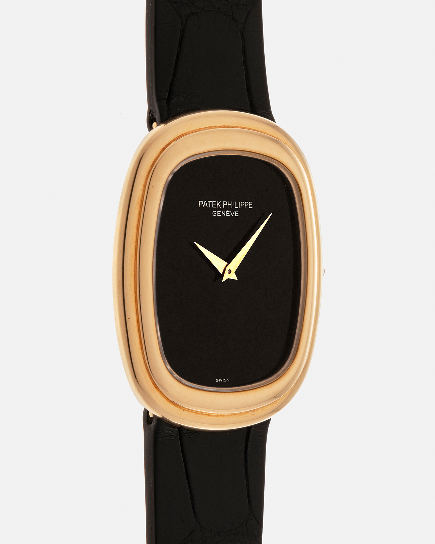 Brand: Patek Philippe
Year: 1977
Model: Ellipse
Reference Number: 3730
Material: 18-carat Yellow Gold Case, Onyx Dial
Movement: Patek Philippe Cal. 215, Manual-Winding
Case Dimensions: 31mm x 6mm (Lug-to-Lug 38.5mm)
Lug Width: 17mm
Strap: Custom Handdn Black Alligator Stitchless Leather Strap with Signed 18-carat Yellow Gold Ellipse Buckle