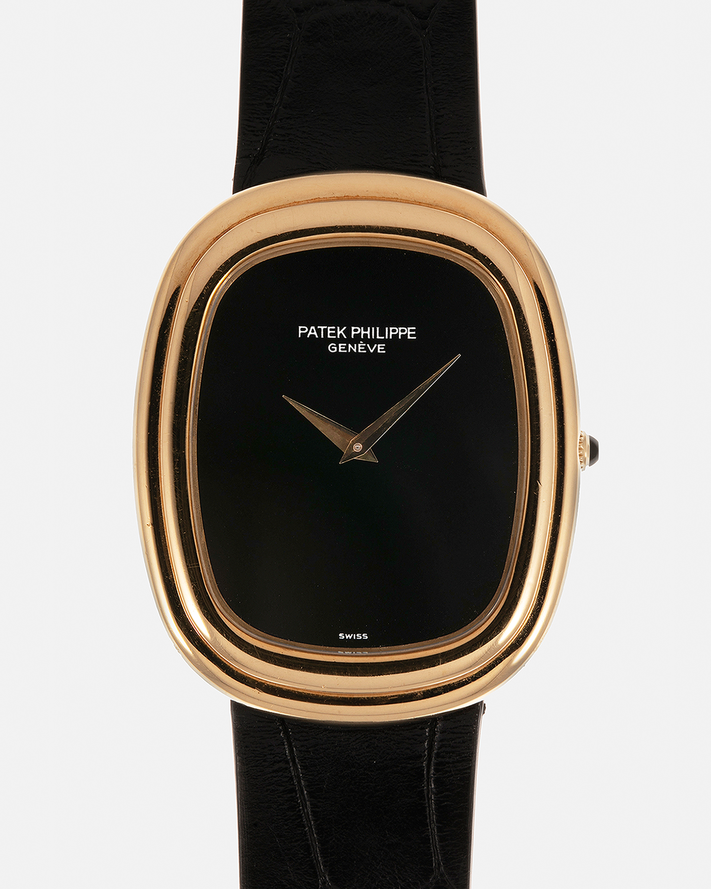 Brand: Patek Philippe
Year: 1977
Model: Ellipse
Reference Number: 3730
Material: 18-carat Yellow Gold Case, Onyx Dial
Movement: Patek Philippe Cal. 215, Manual-Winding
Case Dimensions: 31mm x 6mm (Lug-to-Lug 38.5mm)
Lug Width: 17mm
Strap: Custom Handdn Black Alligator Stitchless Leather Strap with Signed 18-carat Yellow Gold Ellipse Buckle