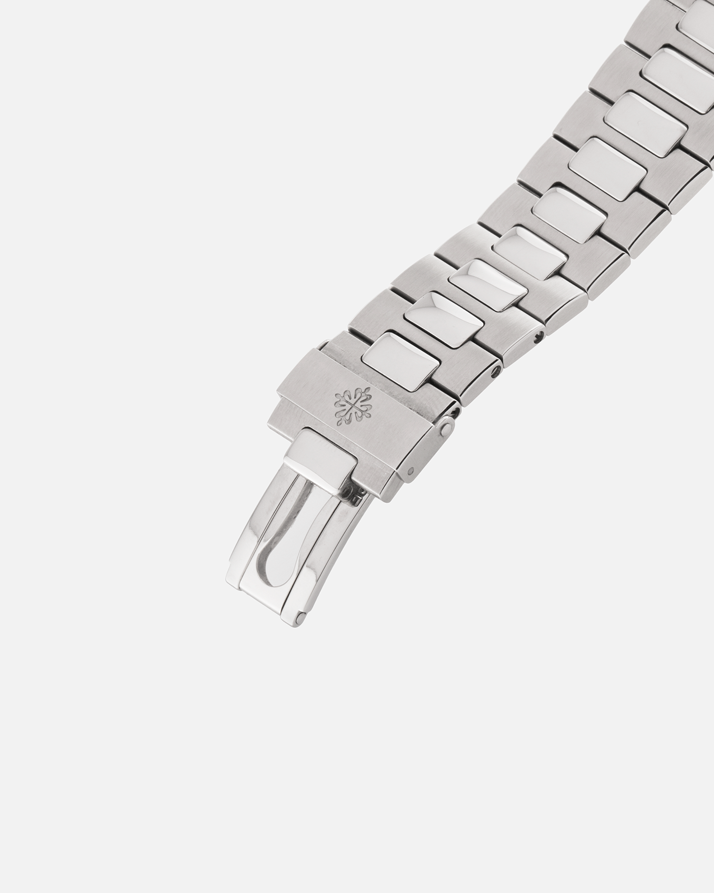 Brand: Patek Philippe
Year: 2005
Model: Nautilus
Reference Number: 3712A
Material: Stainless Steel
Movement: Patek Philippe Calibre 240 PS IRM C LU, Self-Winding
Case Dimensions: 40mm Diameter, 8.5mm Thickness
Bracelet: Patek Philippe Integrated 18-carat Rose Gold Bracelet
