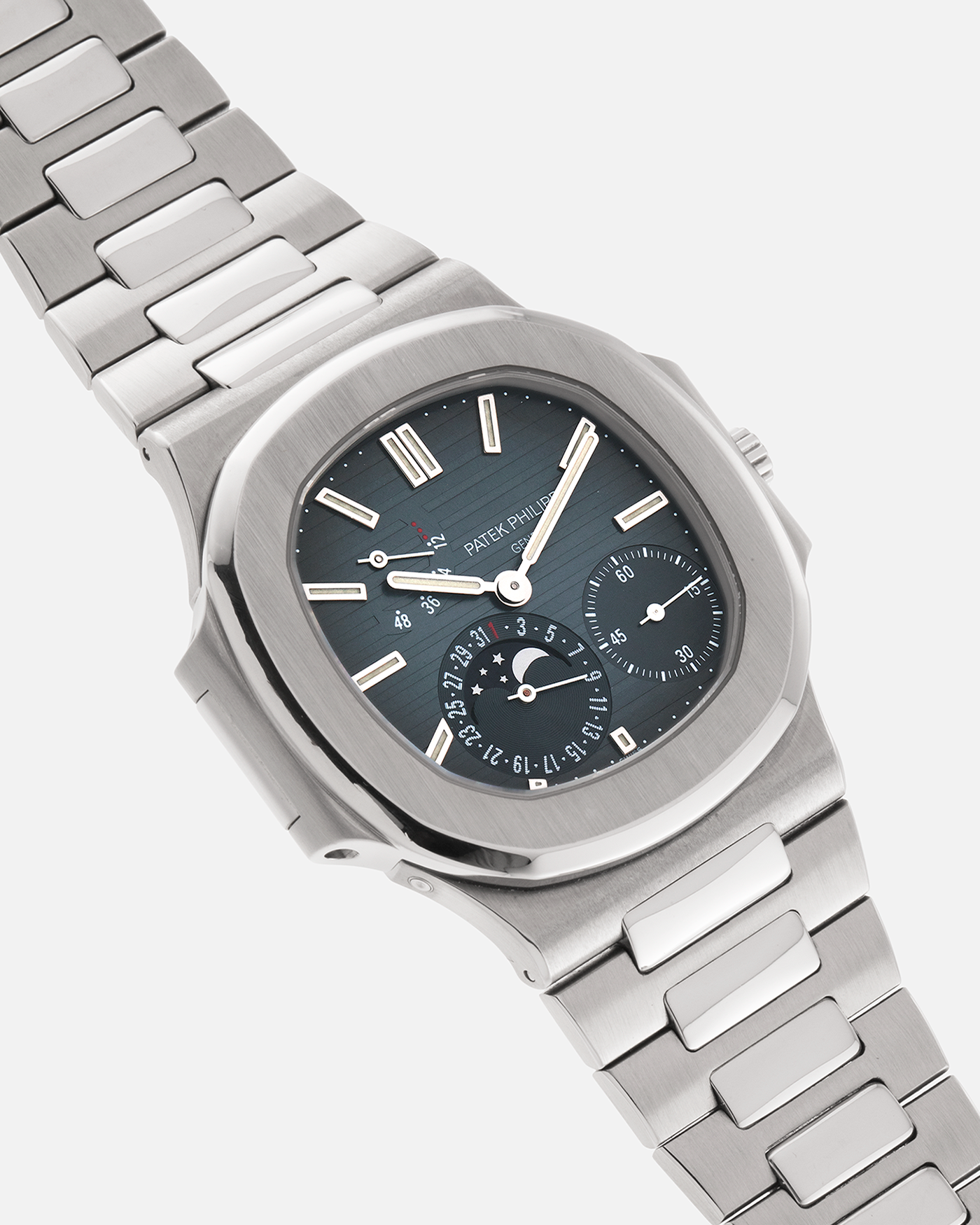 Brand: Patek Philippe
Year: 2005
Model: Nautilus
Reference Number: 3712A
Material: Stainless Steel
Movement: Patek Philippe Calibre 240 PS IRM C LU, Self-Winding
Case Dimensions: 40mm Diameter, 8.5mm Thickness
Bracelet: Patek Philippe Integrated 18-carat Rose Gold Bracelet