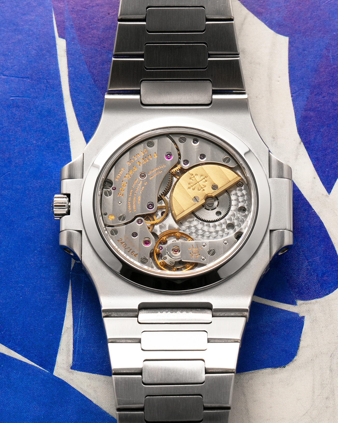 Brand: Patek Philippe
Year: 2005
Model: Nautilus
Reference Number: 3712A
Material: Stainless Steel
Movement: Patek Philippe Calibre 240 PS IRM C LU, Self-Winding
Case Dimensions: 40mm Diameter, 8.5mm Thickness
Bracelet: Patek Philippe Integrated 18-carat Rose Gold Bracelet