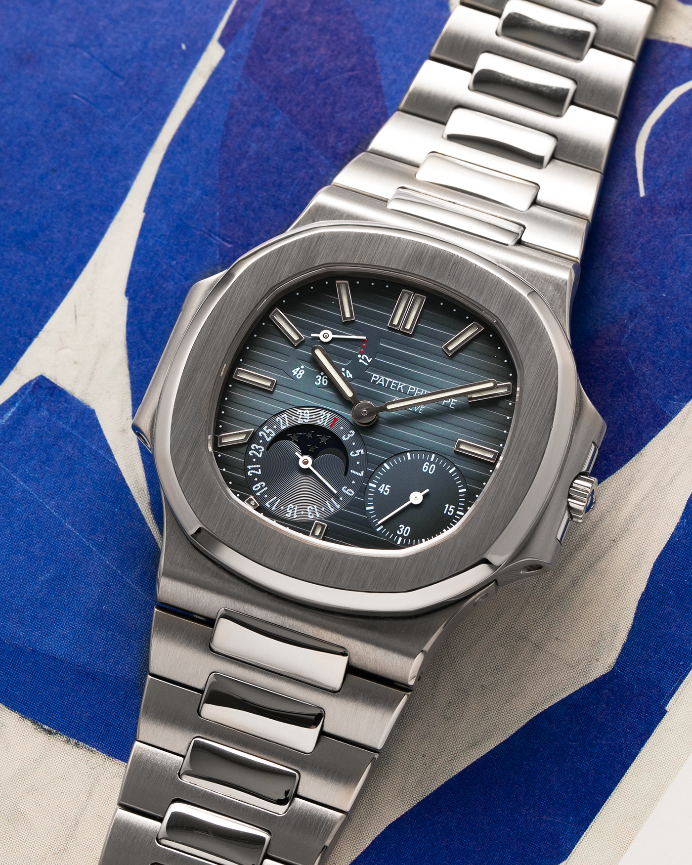 Brand: Patek Philippe
Year: 2005
Model: Nautilus
Reference Number: 3712A
Material: Stainless Steel
Movement: Patek Philippe Calibre 240 PS IRM C LU, Self-Winding
Case Dimensions: 40mm Diameter, 8.5mm Thickness
Bracelet: Patek Philippe Integrated 18-carat Rose Gold Bracelet
