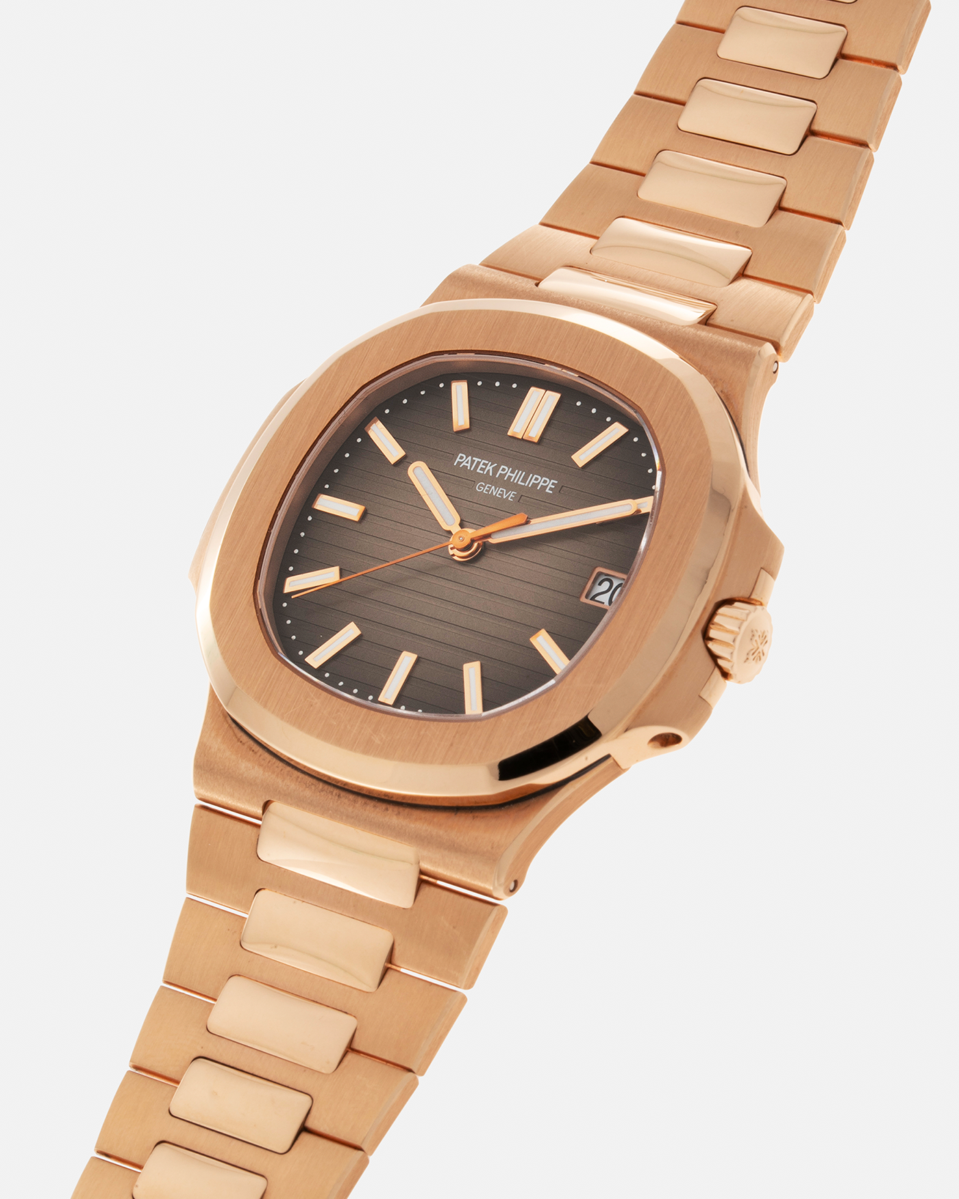 Brand: Patek Philippe Year: 2015 Model: Nautilus Reference Number: 5711R Material: 18-carat Rose Gold Movement: Patek Philippe Cal. 324SC, Self-Winding Case Dimensions: 40mm x 8.6mm Bracelet: Patek Philippe 18-carat Rose Gold Integrated Bracelet