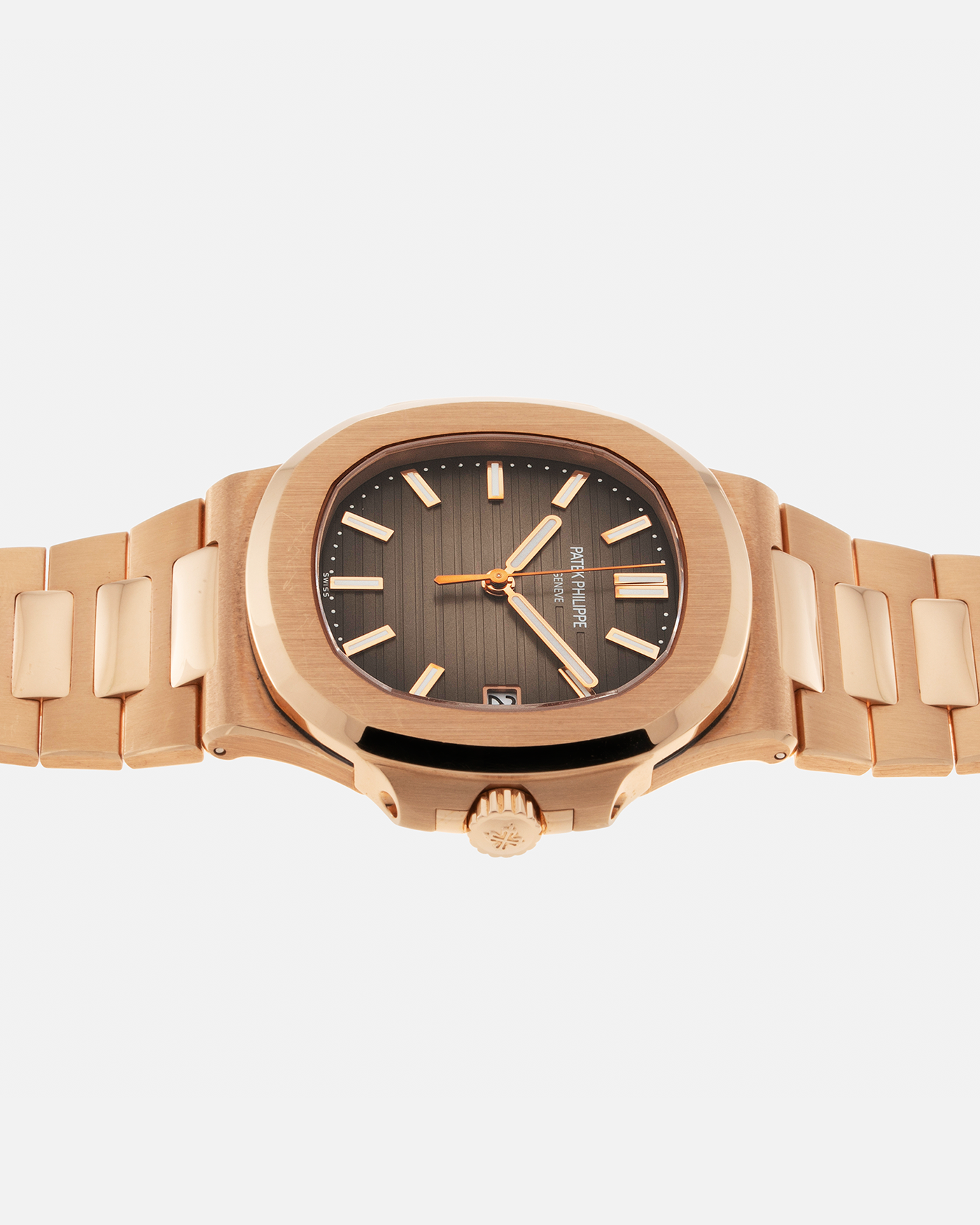 Brand: Patek Philippe Year: 2015 Model: Nautilus Reference Number: 5711R Material: 18-carat Rose Gold Movement: Patek Philippe Cal. 324SC, Self-Winding Case Dimensions: 40mm x 8.6mm Bracelet: Patek Philippe 18-carat Rose Gold Integrated Bracelet