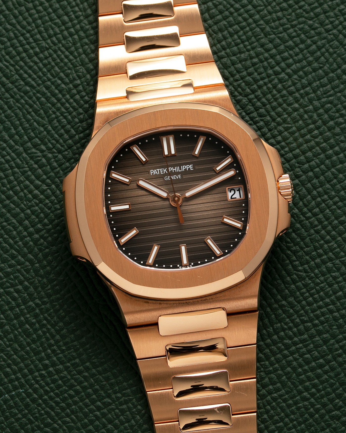 Brand: Patek Philippe Year: 2015 Model: Nautilus Reference Number: 5711R Material: 18-carat Rose Gold Movement: Patek Philippe Cal. 324SC, Self-Winding Case Dimensions: 40mm x 8.6mm Bracelet: Patek Philippe 18-carat Rose Gold Integrated Bracelet