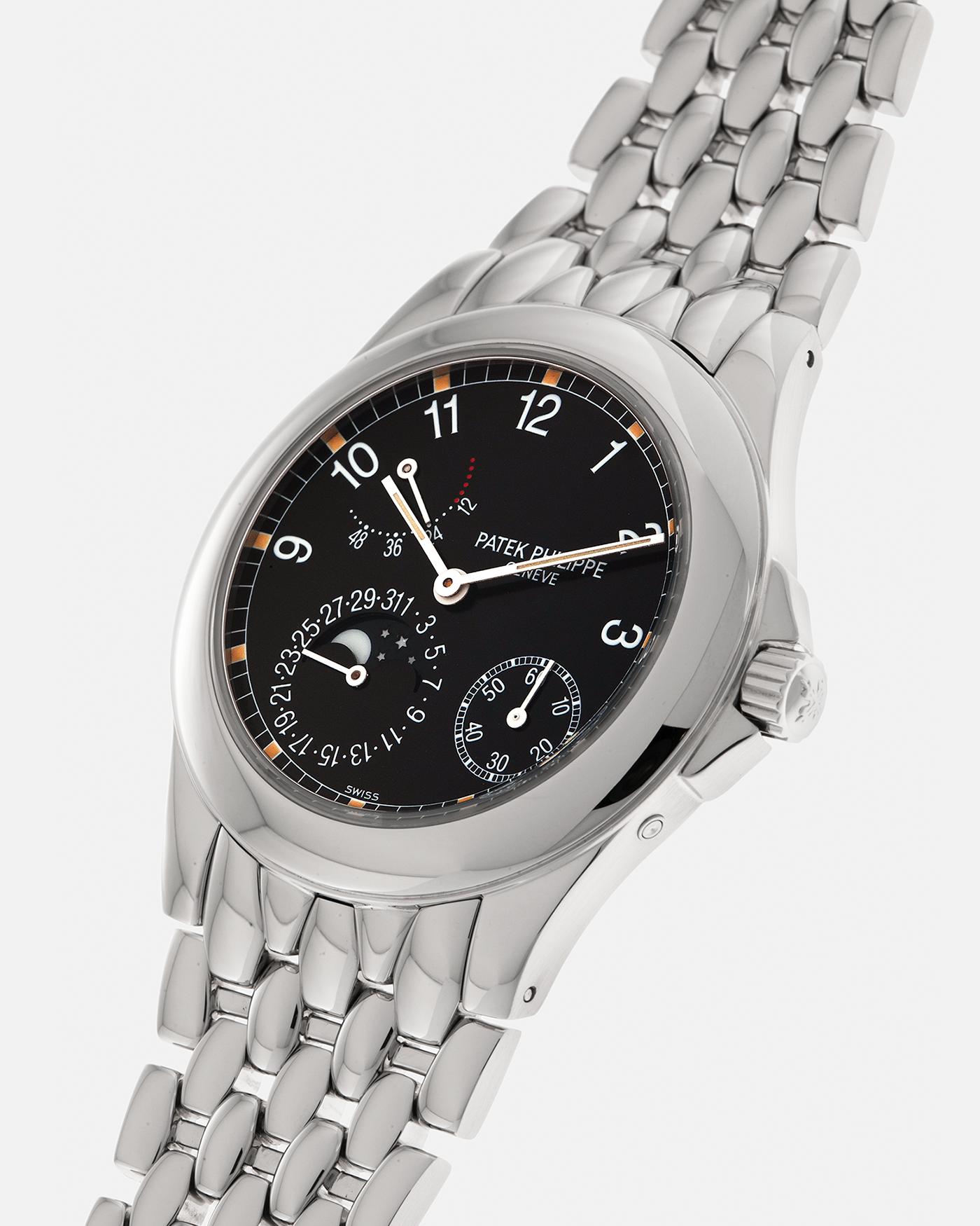 Brand: Patek Philippe
Year: 2001
Reference: 5085A Neptune
Material: Stainless Steel
Movement: Patek Philippe Cal. 240/164 PS IRM C LU, Self-Winding Micro-Rotor
Case Dimensions: 37mm x 10mm (Lug-to-Lug 43.5mm)
Bracelet: Patek Philippe Stainless Steel Multi-Link Fish-Scale Bracelet with Double-Folding Clasp