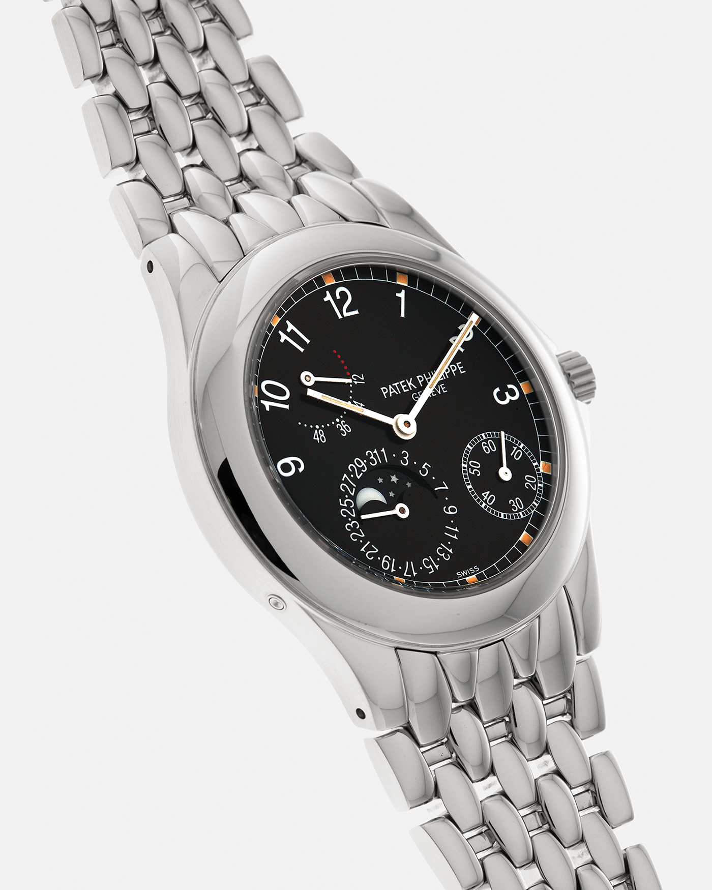 Brand: Patek Philippe
Year: 2001
Reference: 5085A Neptune
Material: Stainless Steel
Movement: Patek Philippe Cal. 240/164 PS IRM C LU, Self-Winding Micro-Rotor
Case Dimensions: 37mm x 10mm (Lug-to-Lug 43.5mm)
Bracelet: Patek Philippe Stainless Steel Multi-Link Fish-Scale Bracelet with Double-Folding Clasp