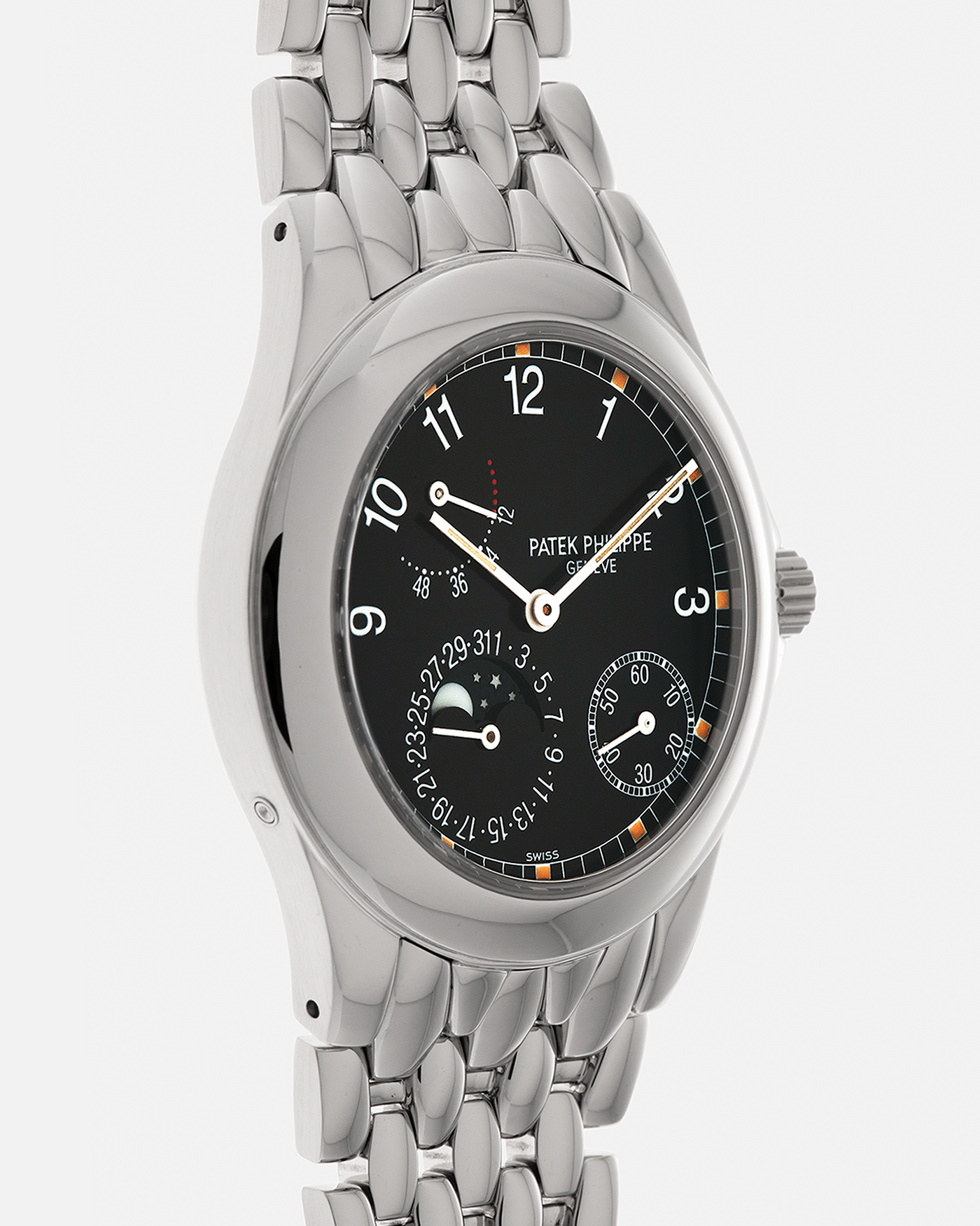 Brand: Patek Philippe
Year: 2001
Reference: 5085A Neptune
Material: Stainless Steel
Movement: Patek Philippe Cal. 240/164 PS IRM C LU, Self-Winding Micro-Rotor
Case Dimensions: 37mm x 10mm (Lug-to-Lug 43.5mm)
Bracelet: Patek Philippe Stainless Steel Multi-Link Fish-Scale Bracelet with Double-Folding Clasp