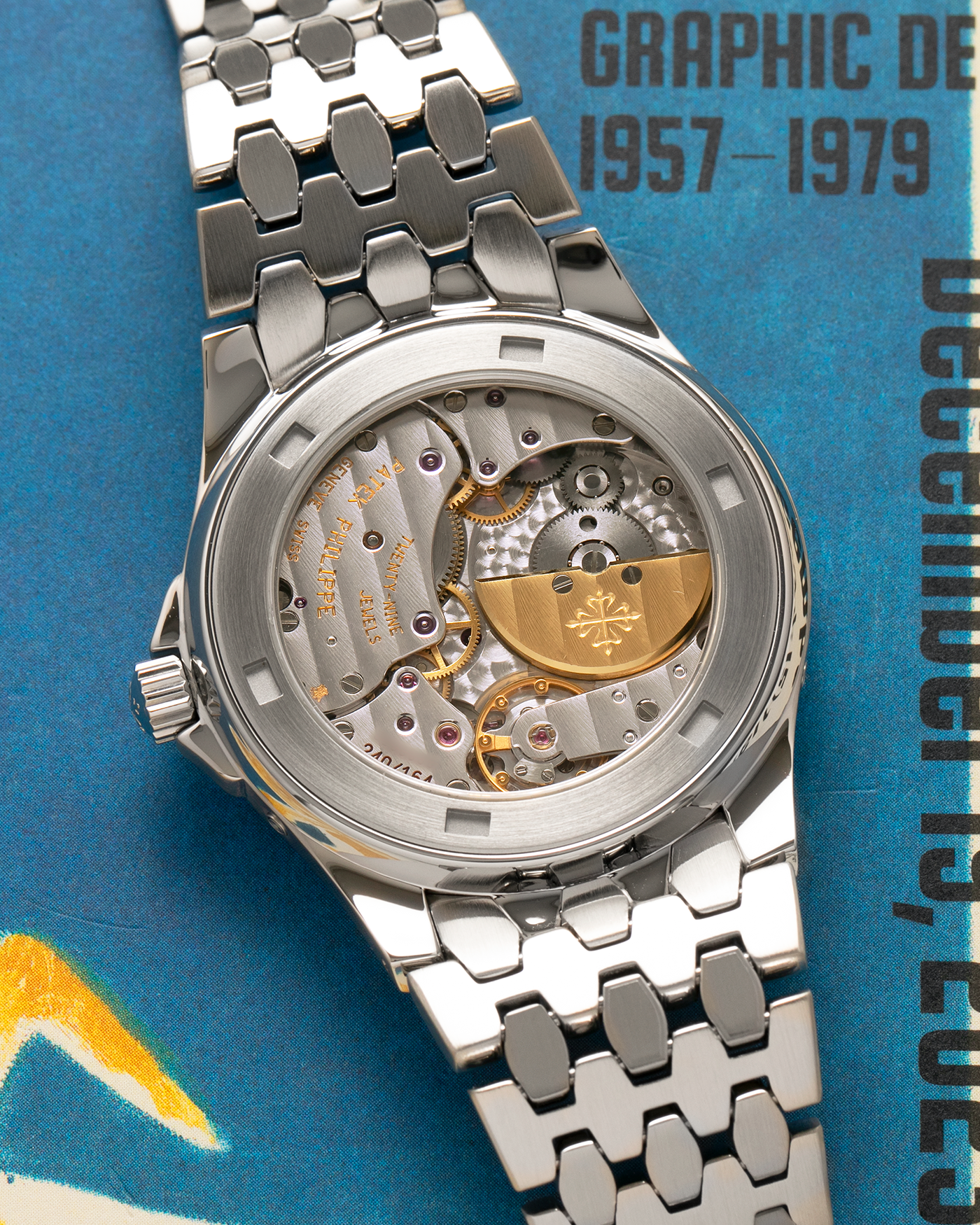 Brand: Patek Philippe
Year: 2001
Reference: 5085A Neptune
Material: Stainless Steel
Movement: Patek Philippe Cal. 240/164 PS IRM C LU, Self-Winding Micro-Rotor
Case Dimensions: 37mm x 10mm (Lug-to-Lug 43.5mm)
Bracelet: Patek Philippe Stainless Steel Multi-Link Fish-Scale Bracelet with Double-Folding Clasp