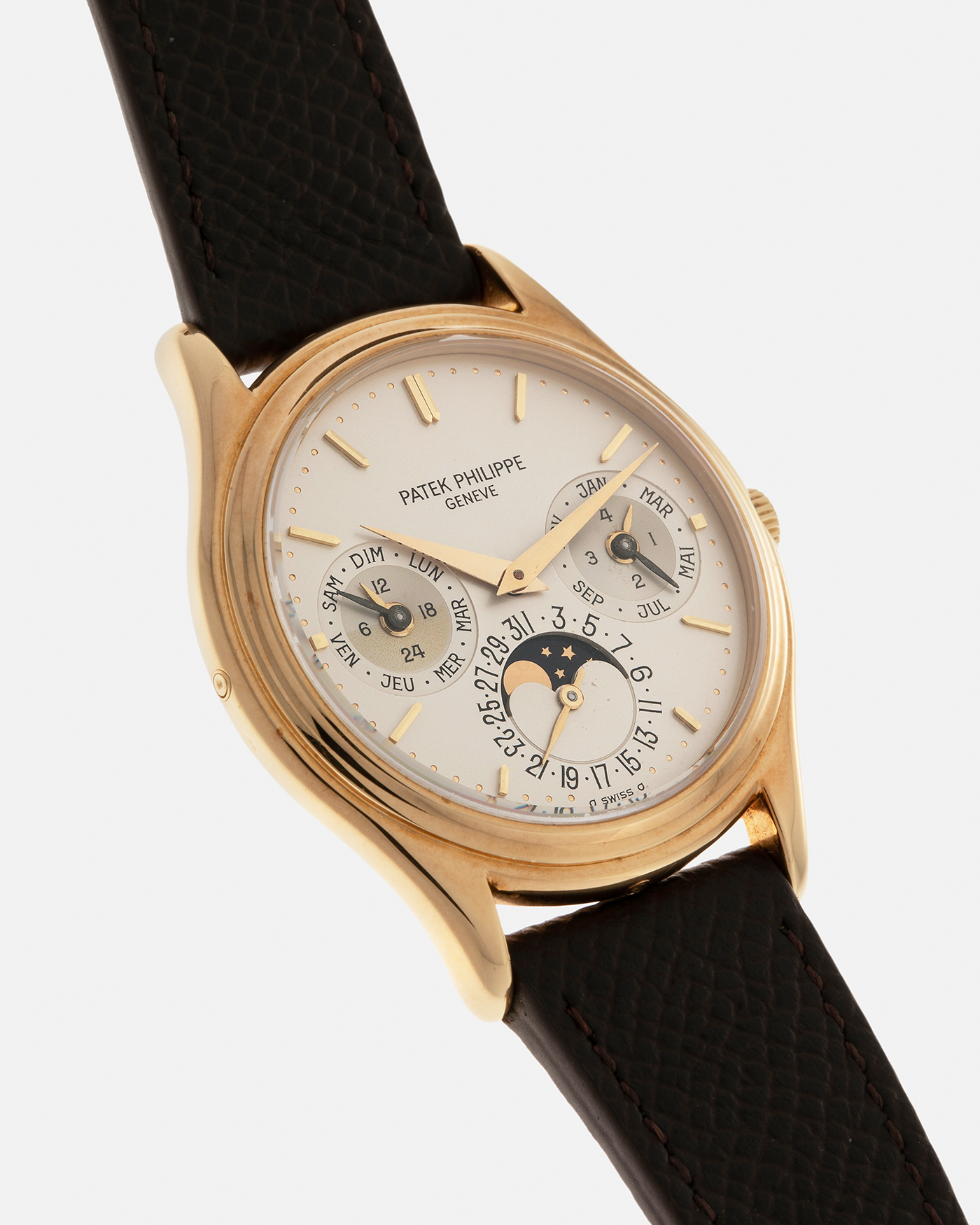 Brand: Patek Philippe
Year: 1989
Model: Perpetual Calendar ‘2nd Series’
Reference Number: 3940J
Material: 18-carat Yellow Gold
Movement: Patek Philippe Cal. 240Q, Self-Winding Micro-Rotor
Case Dimensions: 36mm x 8.5mm (Lug-to-Lug 43.3mm)
Lug Width: 18mm
Strap: Sotheby’s Dark Brown Textured Calf Leather Strap with Signed 18-carat Yellow Gold Tang Buckle