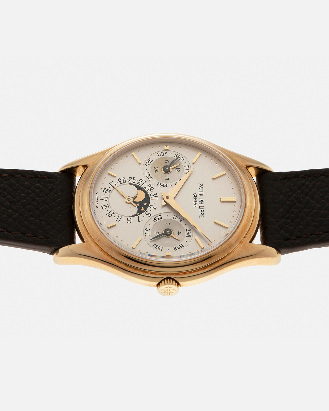 Brand: Patek Philippe
Year: 1989
Model: Perpetual Calendar ‘2nd Series’
Reference Number: 3940J
Material: 18-carat Yellow Gold
Movement: Patek Philippe Cal. 240Q, Self-Winding Micro-Rotor
Case Dimensions: 36mm x 8.5mm (Lug-to-Lug 43.3mm)
Lug Width: 18mm
Strap: Sotheby’s Dark Brown Textured Calf Leather Strap with Signed 18-carat Yellow Gold Tang Buckle