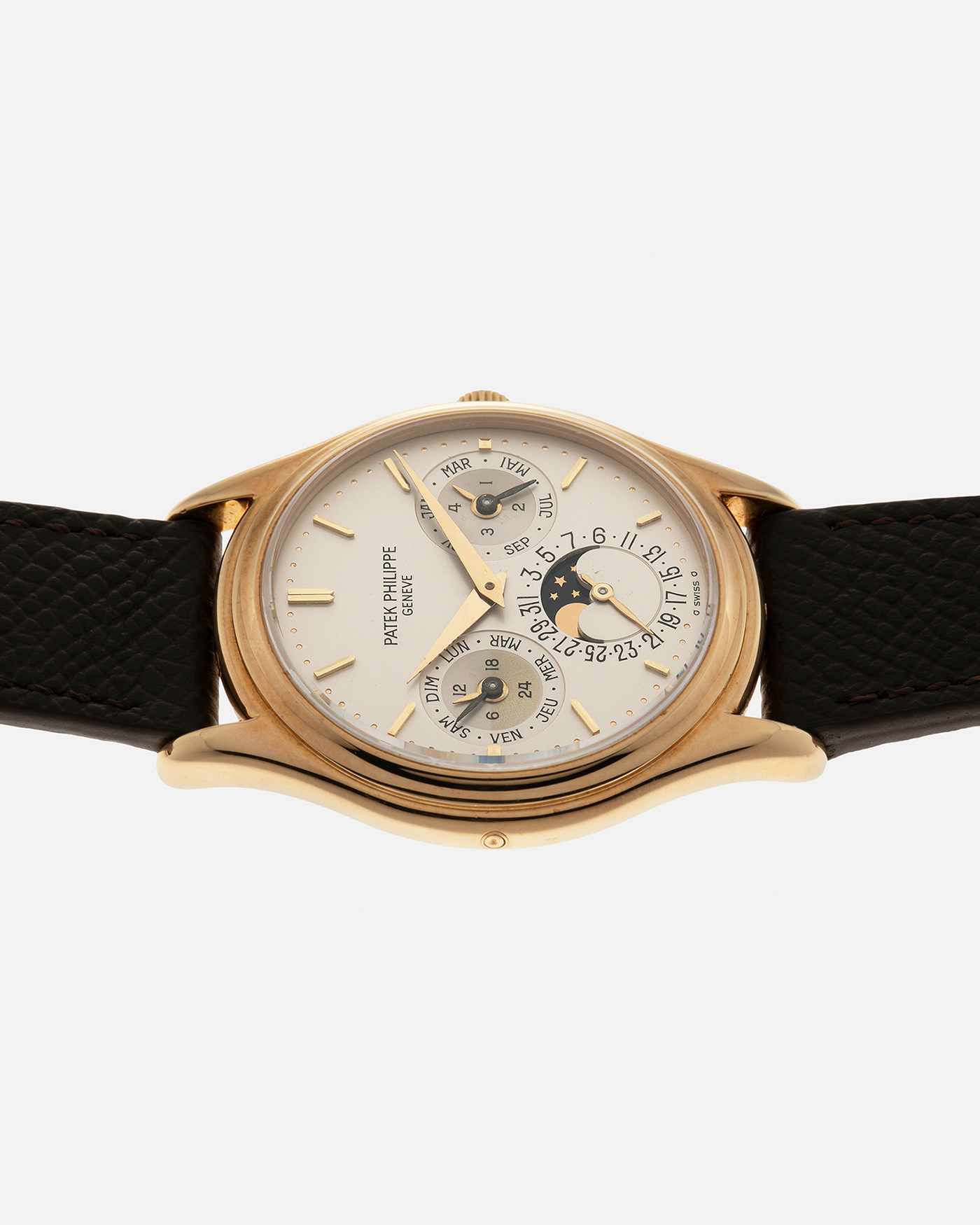 Brand: Patek Philippe
Year: 1989
Model: Perpetual Calendar ‘2nd Series’
Reference Number: 3940J
Material: 18-carat Yellow Gold
Movement: Patek Philippe Cal. 240Q, Self-Winding Micro-Rotor
Case Dimensions: 36mm x 8.5mm (Lug-to-Lug 43.3mm)
Lug Width: 18mm
Strap: Sotheby’s Dark Brown Textured Calf Leather Strap with Signed 18-carat Yellow Gold Tang Buckle