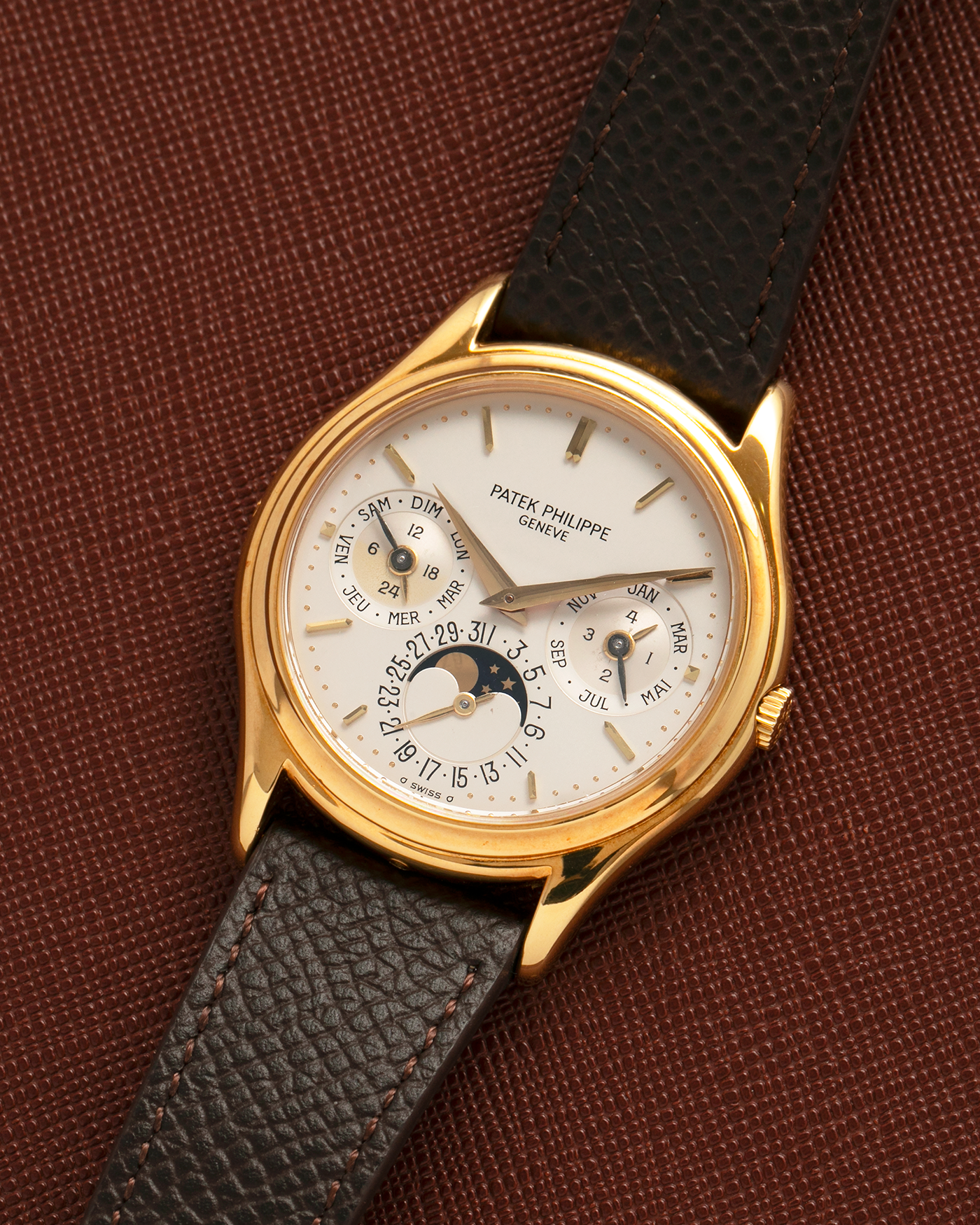 Brand: Patek Philippe
Year: 1989
Model: Perpetual Calendar ‘2nd Series’
Reference Number: 3940J
Material: 18-carat Yellow Gold
Movement: Patek Philippe Cal. 240Q, Self-Winding Micro-Rotor
Case Dimensions: 36mm x 8.5mm (Lug-to-Lug 43.3mm)
Lug Width: 18mm
Strap: Sotheby’s Dark Brown Textured Calf Leather Strap with Signed 18-carat Yellow Gold Tang Buckle