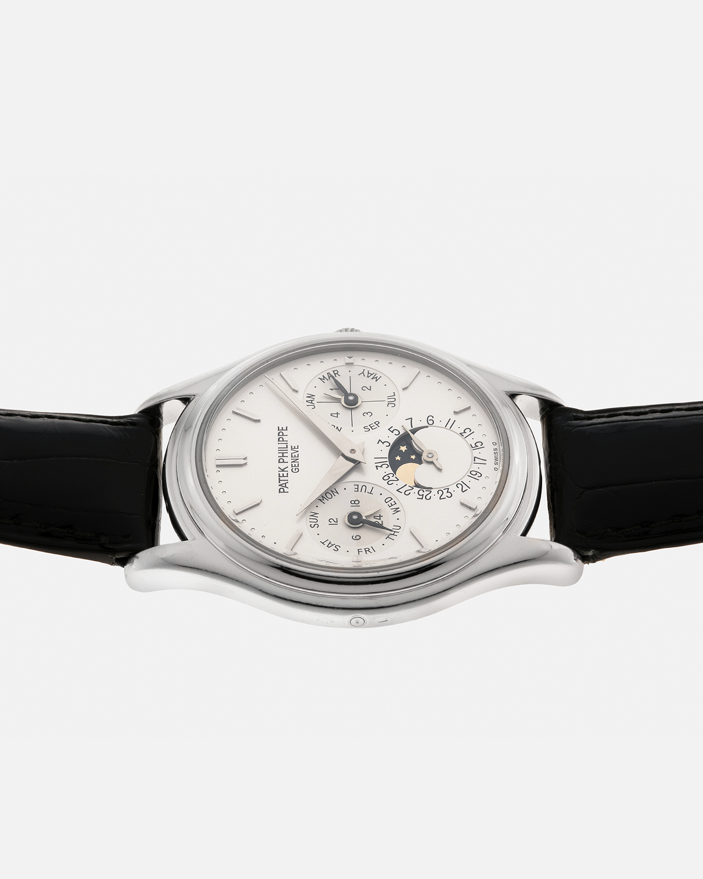 Brand: Patek Philippe
Year: 1994
Model: Perpetual Calendar ‘2nd Series’
Reference Number: 3940P
Material: Platinum 950
Movement: Patek Philippe Cal. 240Q, Self-Winding Micro-Rotor
Case Dimensions: 36mm x 8.5mm (Lug-to-Lug 43.3mm)
Lug Width: 18mm
Strap: Patek Philippe Black Alligator Leather Strap with Signed Platinum 950 Deployant Clasp