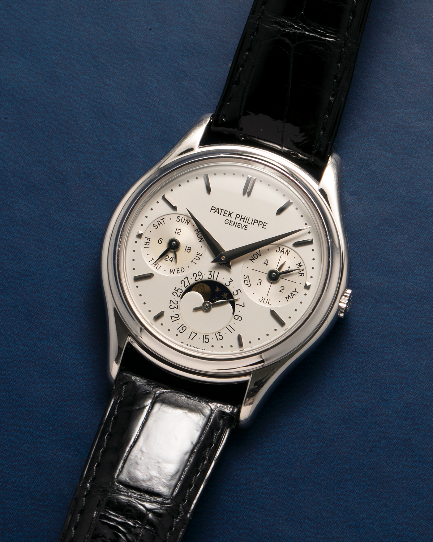 Brand: Patek Philippe
Year: 1994
Model: Perpetual Calendar ‘2nd Series’
Reference Number: 3940P
Material: Platinum 950
Movement: Patek Philippe Cal. 240Q, Self-Winding Micro-Rotor
Case Dimensions: 36mm x 8.5mm (Lug-to-Lug 43.3mm)
Lug Width: 18mm
Strap: Patek Philippe Black Alligator Leather Strap with Signed Platinum 950 Deployant Clasp