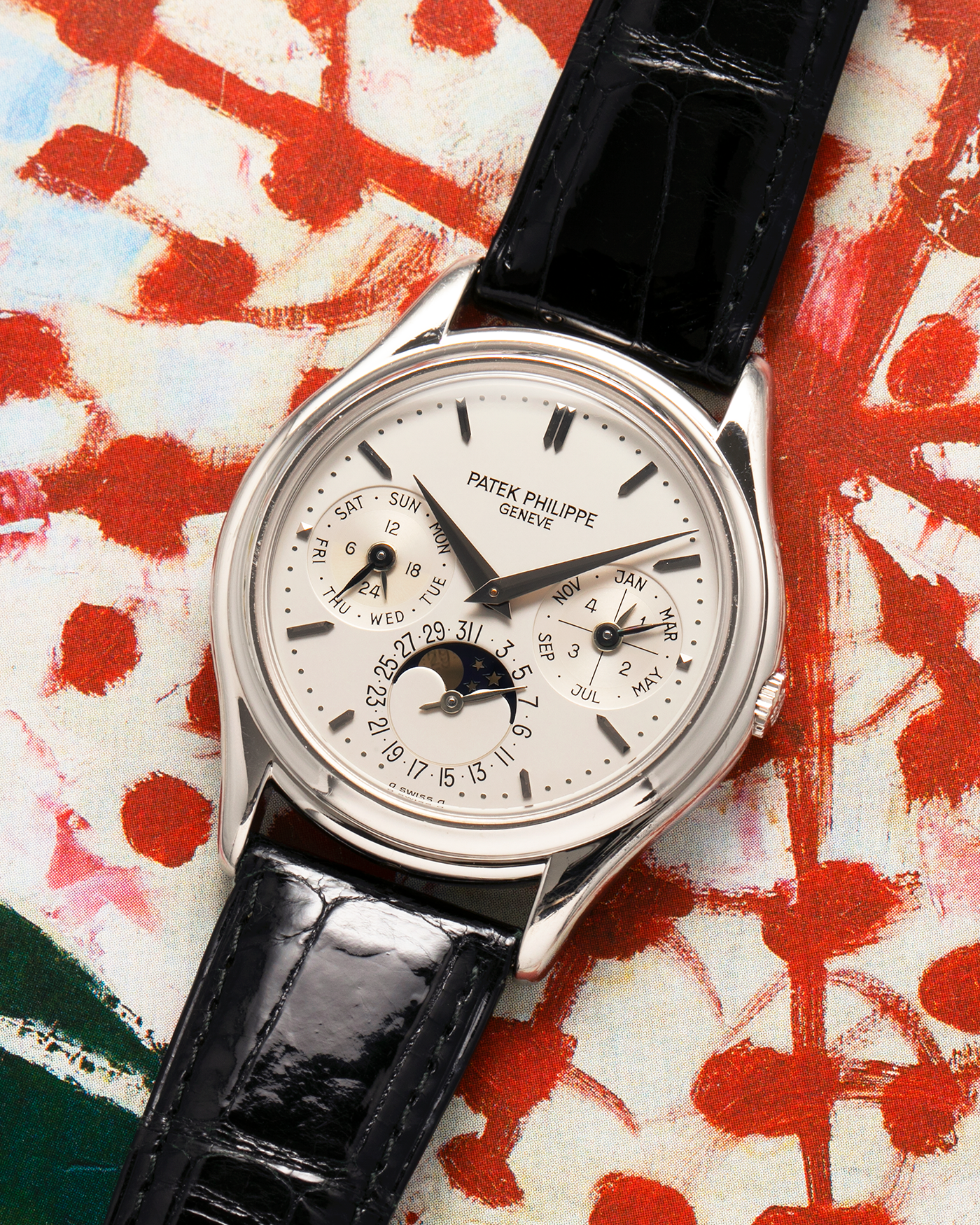 Brand: Patek Philippe
Year: 1994
Model: Perpetual Calendar ‘2nd Series’
Reference Number: 3940P
Material: Platinum 950
Movement: Patek Philippe Cal. 240Q, Self-Winding Micro-Rotor
Case Dimensions: 36mm x 8.5mm (Lug-to-Lug 43.3mm)
Lug Width: 18mm
Strap: Patek Philippe Black Alligator Leather Strap with Signed Platinum 950 Deployant Clasp