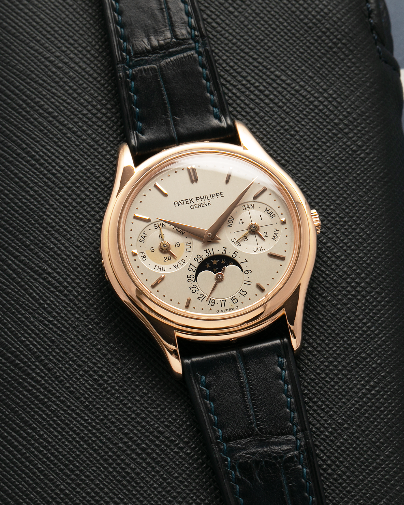 Brand: Patek Philippe
Year Manufactured: 1995
Year Sold: 1996
Reference Number: 3940R
Material: 18k Rose Gold
Movement: Patek Philippe Cal. 240Q, Self-Winding Micro-Rotor
Case Dimensions: 36mm Diameter 8.5mm Thickness
Lug Width: 18mm
Strap: Dark Blue Handdn Alligator Strap with Patek Philippe 18k Rose Gold Tang Buckle and Additional Patek Philippe Black Alligator Leather Strap