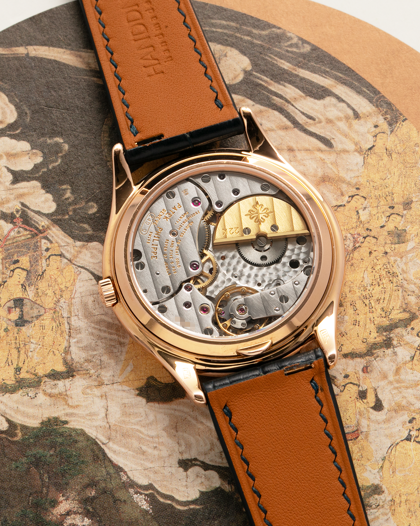 Brand: Patek Philippe
Year Manufactured: 1995
Year Sold: 1996
Reference Number: 3940R
Material: 18k Rose Gold
Movement: Patek Philippe Cal. 240Q, Self-Winding Micro-Rotor
Case Dimensions: 36mm Diameter 8.5mm Thickness
Lug Width: 18mm
Strap: Dark Blue Handdn Alligator Strap with Patek Philippe 18k Rose Gold Tang Buckle and Additional Patek Philippe Black Alligator Leather Strap
