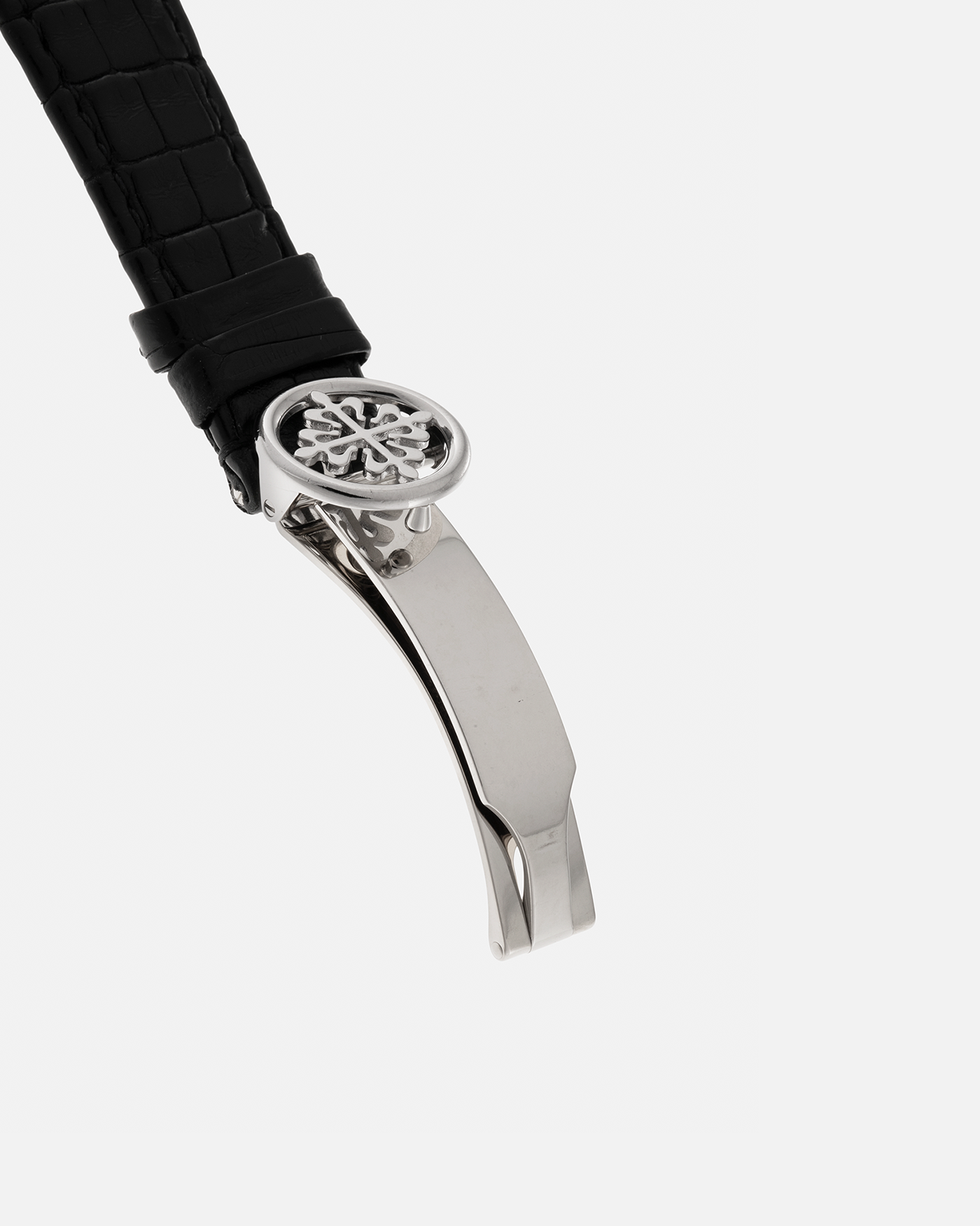 Brand: Patek Philippe
Year: 1995
Model: Perpetual Calendar Chronograph ‘4th Series’
Reference Number: 3970EG
Material: 18-carat White Gold
Movement: Patek Philippe Cal. 27-70 Q (Based on Lemania Cal. 2310), Self-Winding
Movement Number: 3045XXX
Case Dimensions: 36mm x 13mm (43.3mm Lug-to-Lug)
Lug Width: 19mm
Strap: Patek Philippe Black Alligator Leather Strap with Signed 18-carat White Gold Deployant Clasp