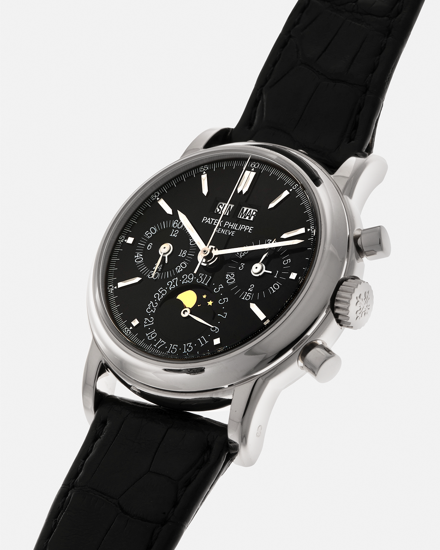 Brand: Patek Philippe
Year: 1995
Model: Perpetual Calendar Chronograph ‘4th Series’
Reference Number: 3970EG
Material: 18-carat White Gold
Movement: Patek Philippe Cal. 27-70 Q (Based on Lemania Cal. 2310), Self-Winding
Movement Number: 3045XXX
Case Dimensions: 36mm x 13mm (43.3mm Lug-to-Lug)
Lug Width: 19mm
Strap: Patek Philippe Black Alligator Leather Strap with Signed 18-carat White Gold Deployant Clasp