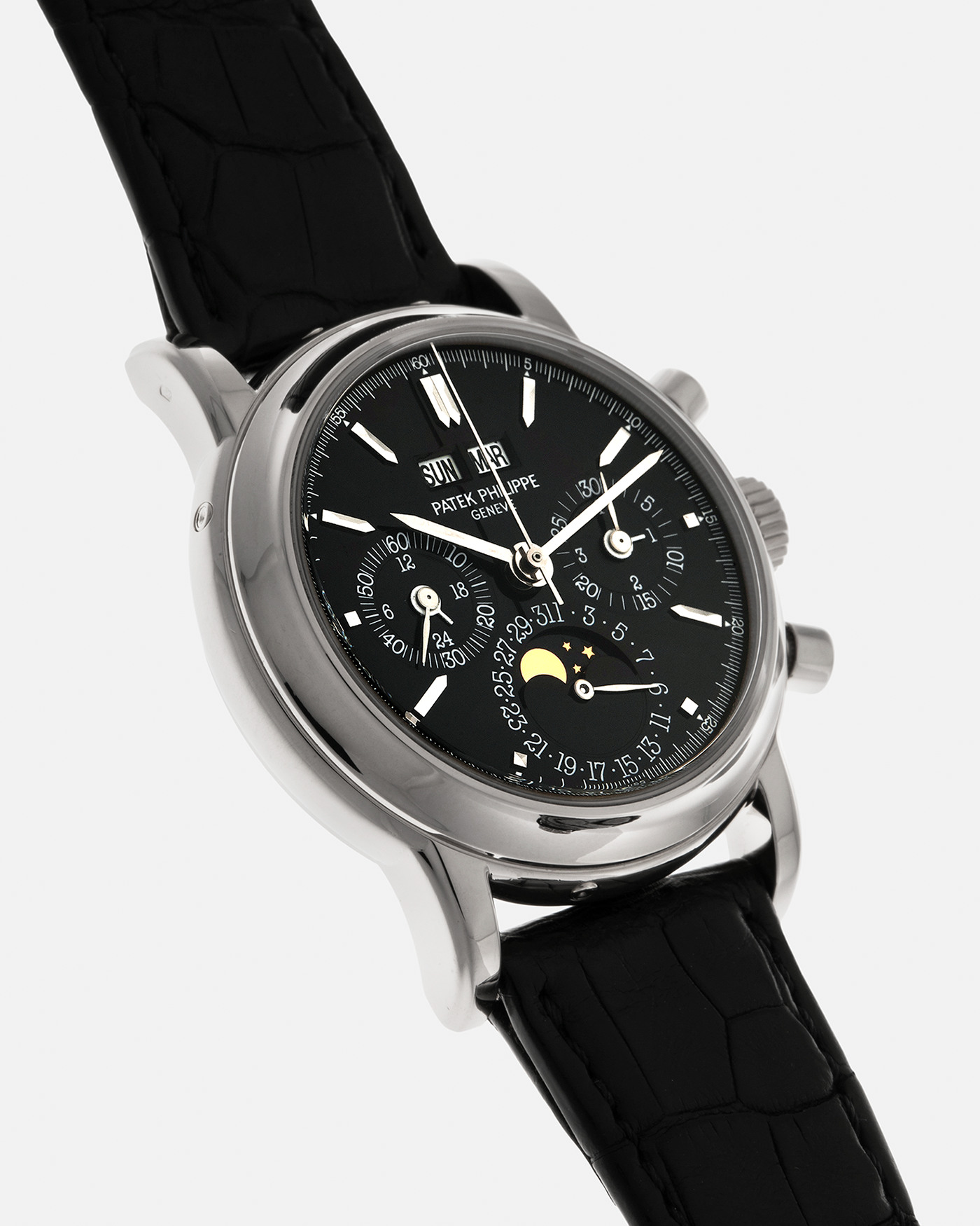 Brand: Patek Philippe
Year: 1995
Model: Perpetual Calendar Chronograph ‘4th Series’
Reference Number: 3970EG
Material: 18-carat White Gold
Movement: Patek Philippe Cal. 27-70 Q (Based on Lemania Cal. 2310), Self-Winding
Movement Number: 3045XXX
Case Dimensions: 36mm x 13mm (43.3mm Lug-to-Lug)
Lug Width: 19mm
Strap: Patek Philippe Black Alligator Leather Strap with Signed 18-carat White Gold Deployant Clasp