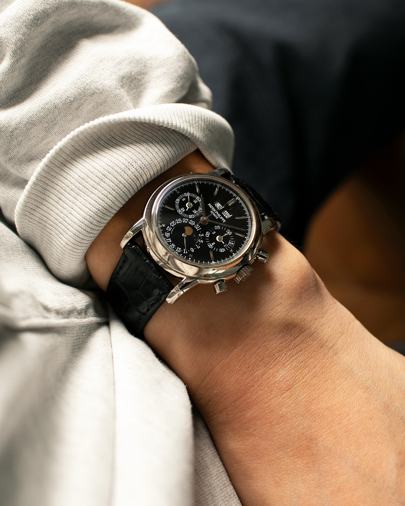 Brand: Patek Philippe
Year: 1995
Model: Perpetual Calendar Chronograph ‘4th Series’
Reference Number: 3970EG
Material: 18-carat White Gold
Movement: Patek Philippe Cal. 27-70 Q (Based on Lemania Cal. 2310), Self-Winding
Movement Number: 3045XXX
Case Dimensions: 36mm x 13mm (43.3mm Lug-to-Lug)
Lug Width: 19mm
Strap: Patek Philippe Black Alligator Leather Strap with Signed 18-carat White Gold Deployant Clasp
